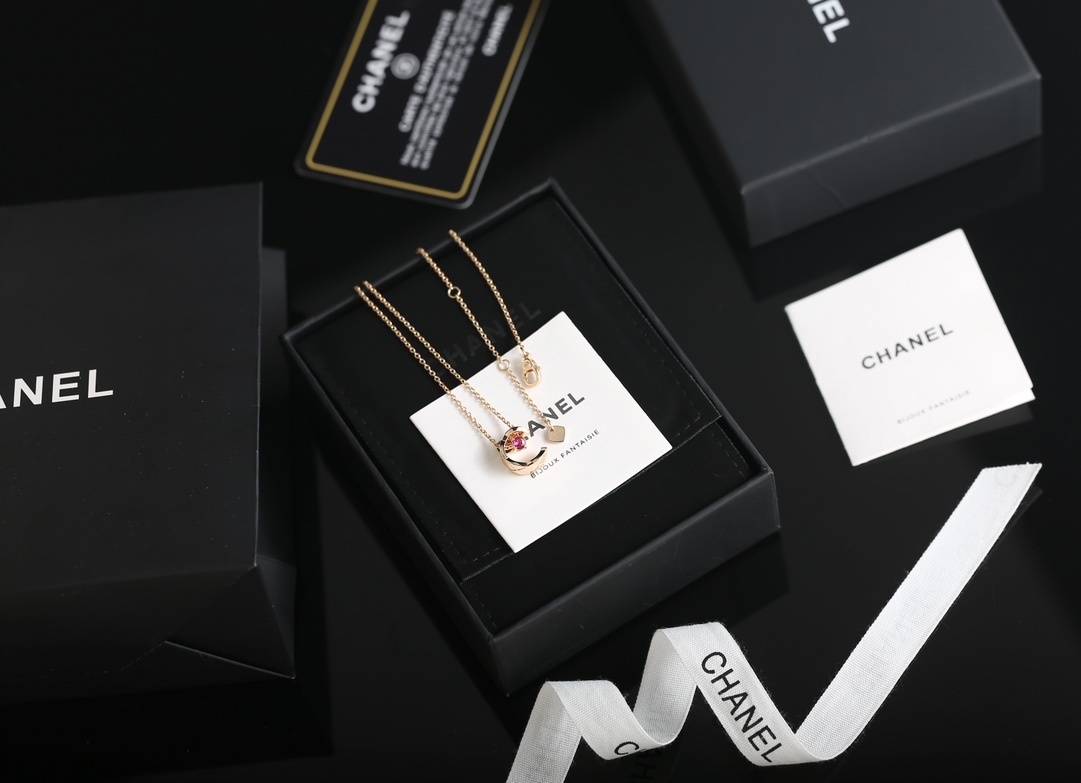 Luxury Rose Gold Quilted Crescent Necklace with Red Ruby Stone