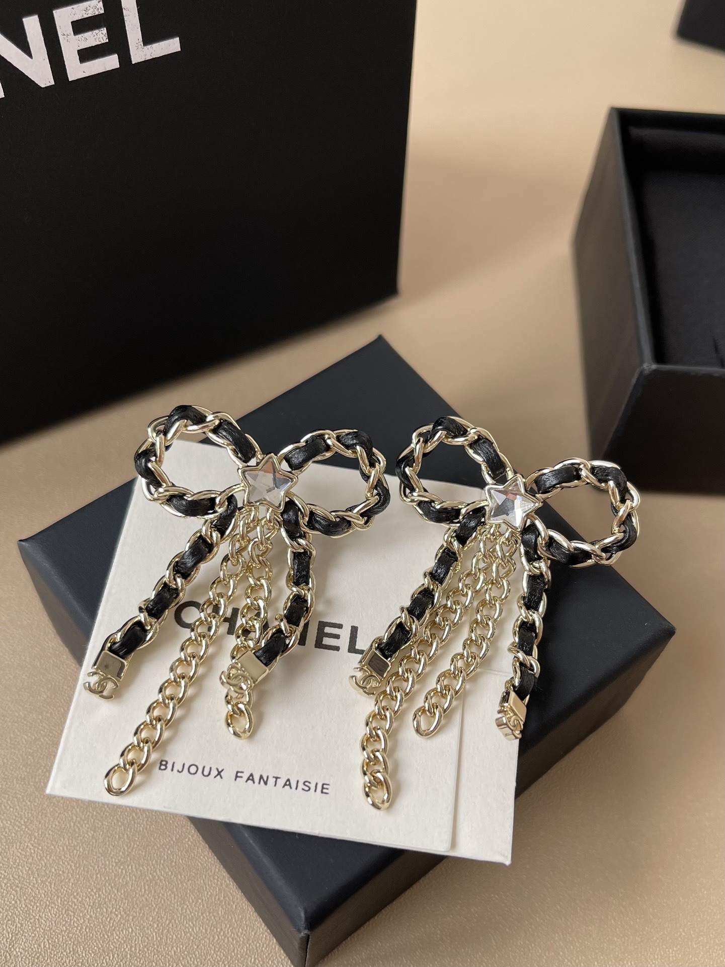 Chanel 2025/26 Bow Pendant Earrings - Gold, Calfskin & Crystal