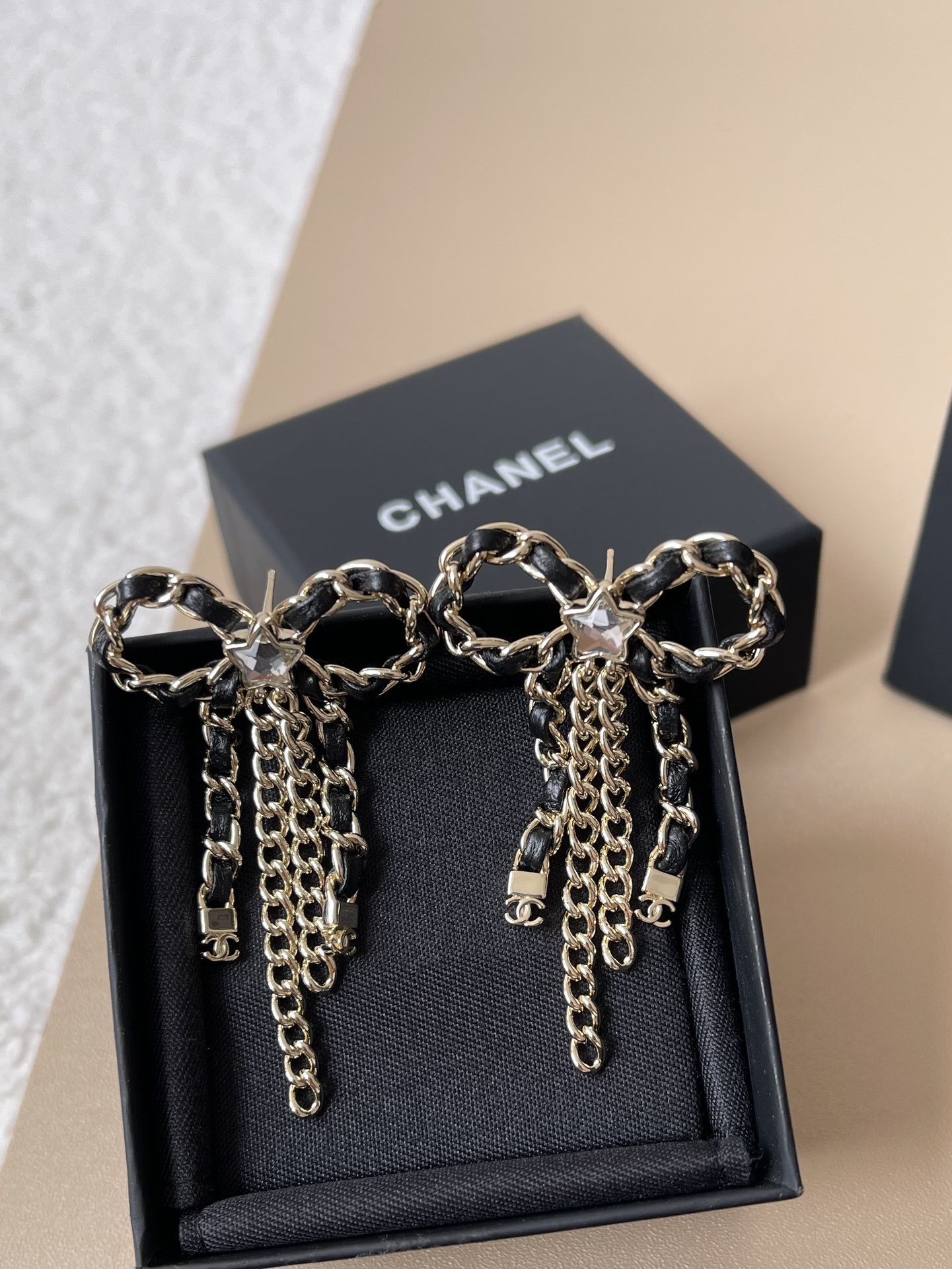 Chanel 2025/26 Bow Pendant Earrings - Gold, Calfskin & Crystal