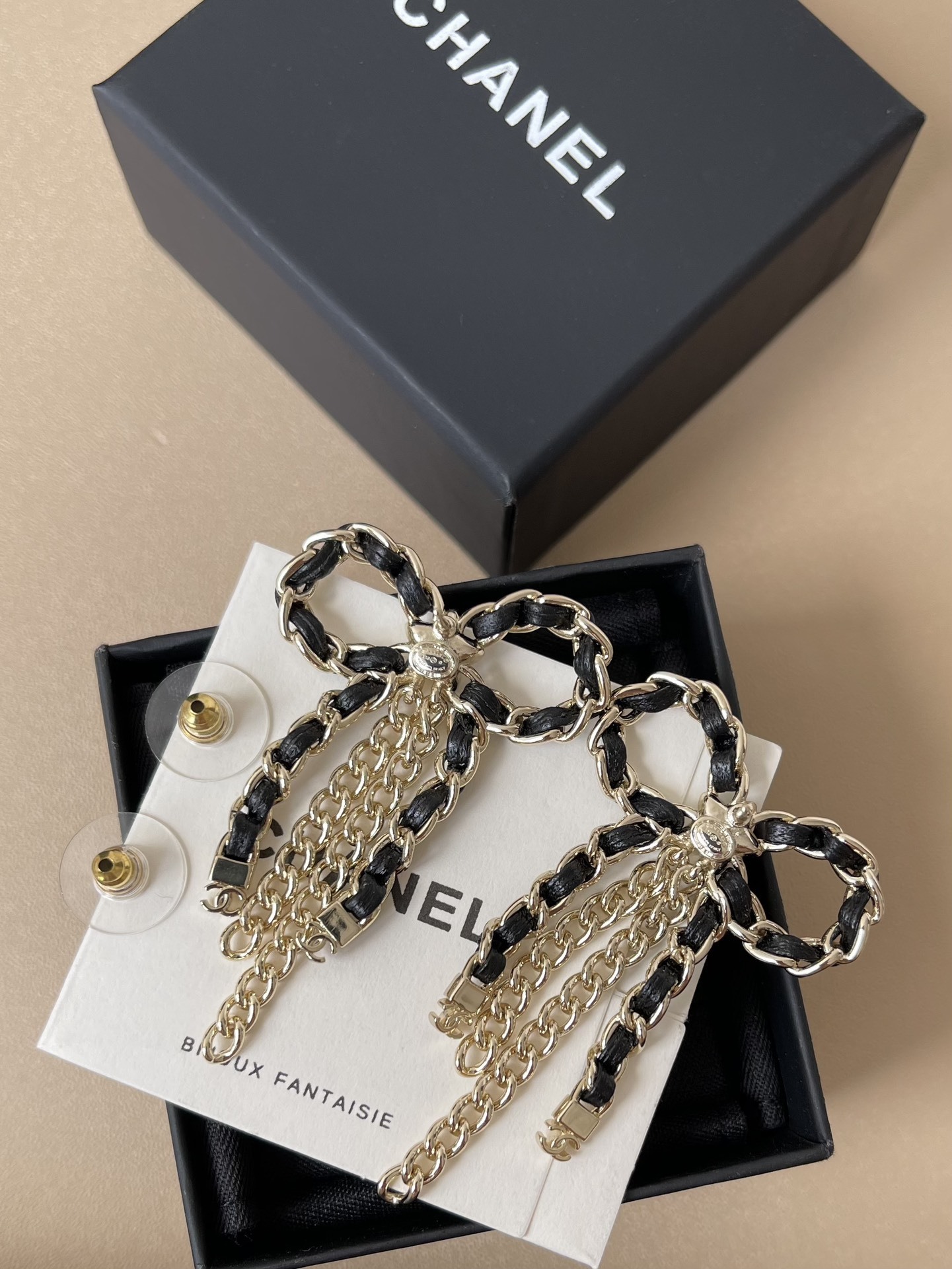 Chanel 2025/26 Bow Pendant Earrings - Gold, Calfskin & Crystal