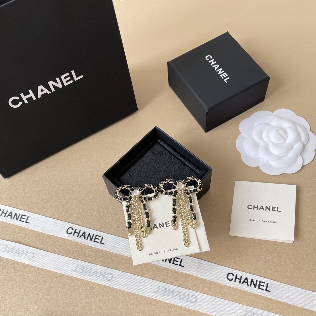 Chanel 2025/26 Bow Pendant Earrings - Gold, Calfskin & Crystal