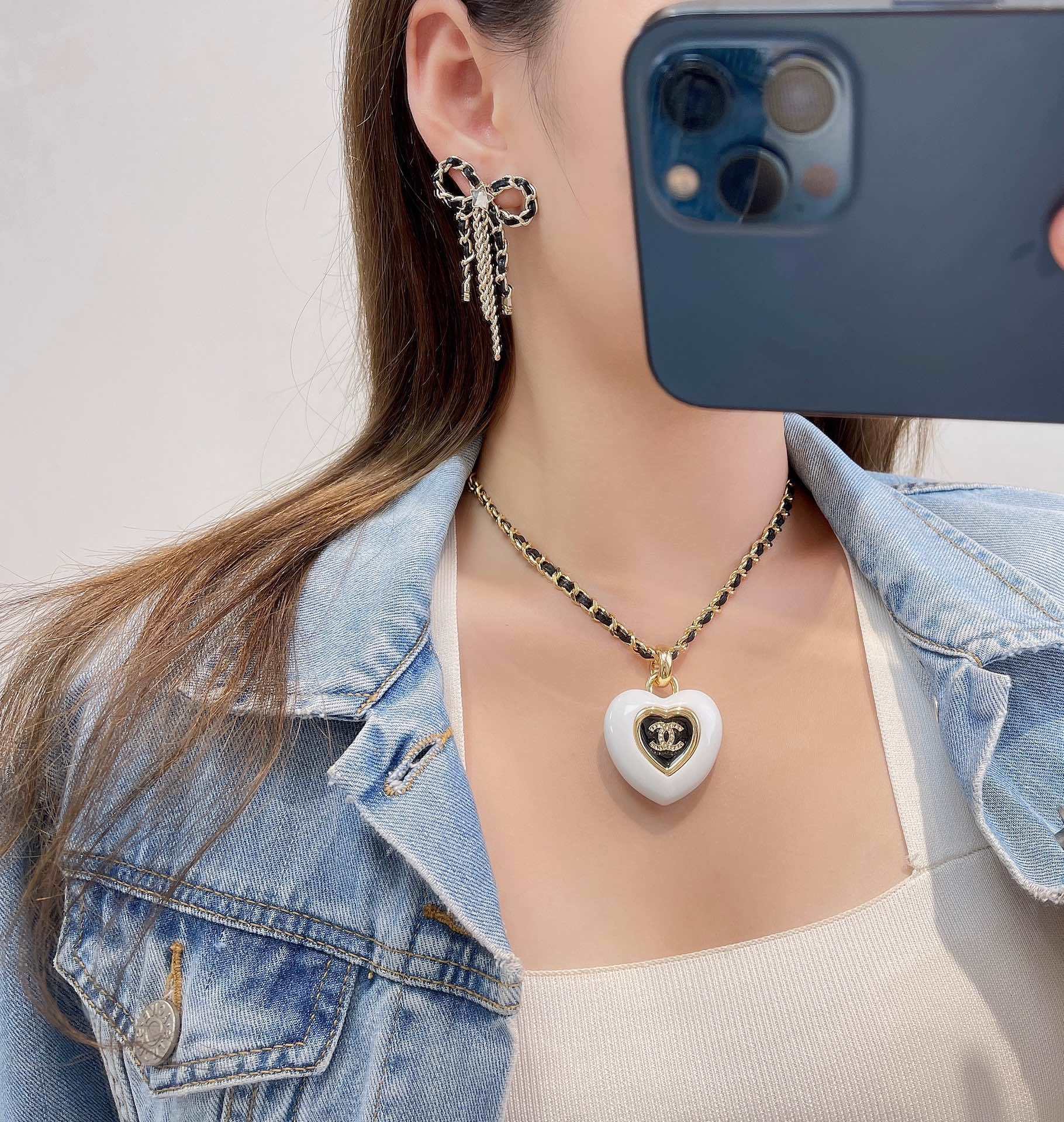 Chanel 2025/26 Bow Pendant Earrings - Gold, Calfskin & Crystal