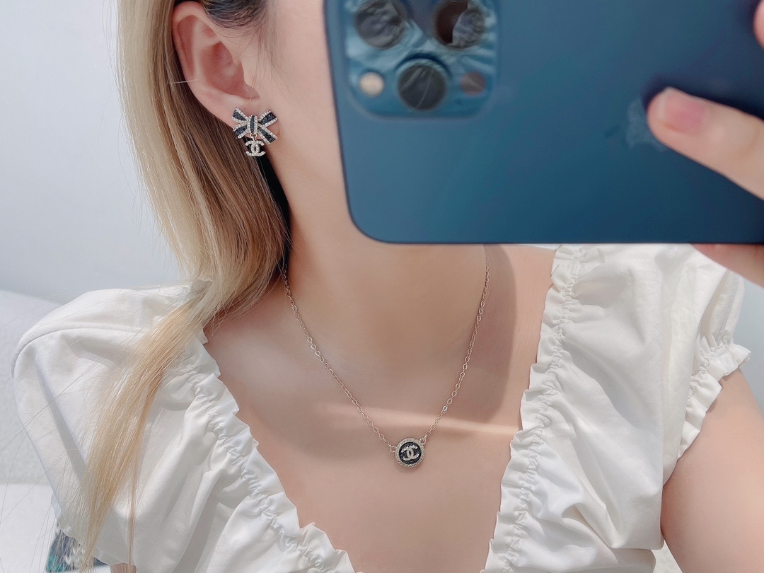 Chanel Crystal Bow Earrings with Black Enamel and CC Logo Drop