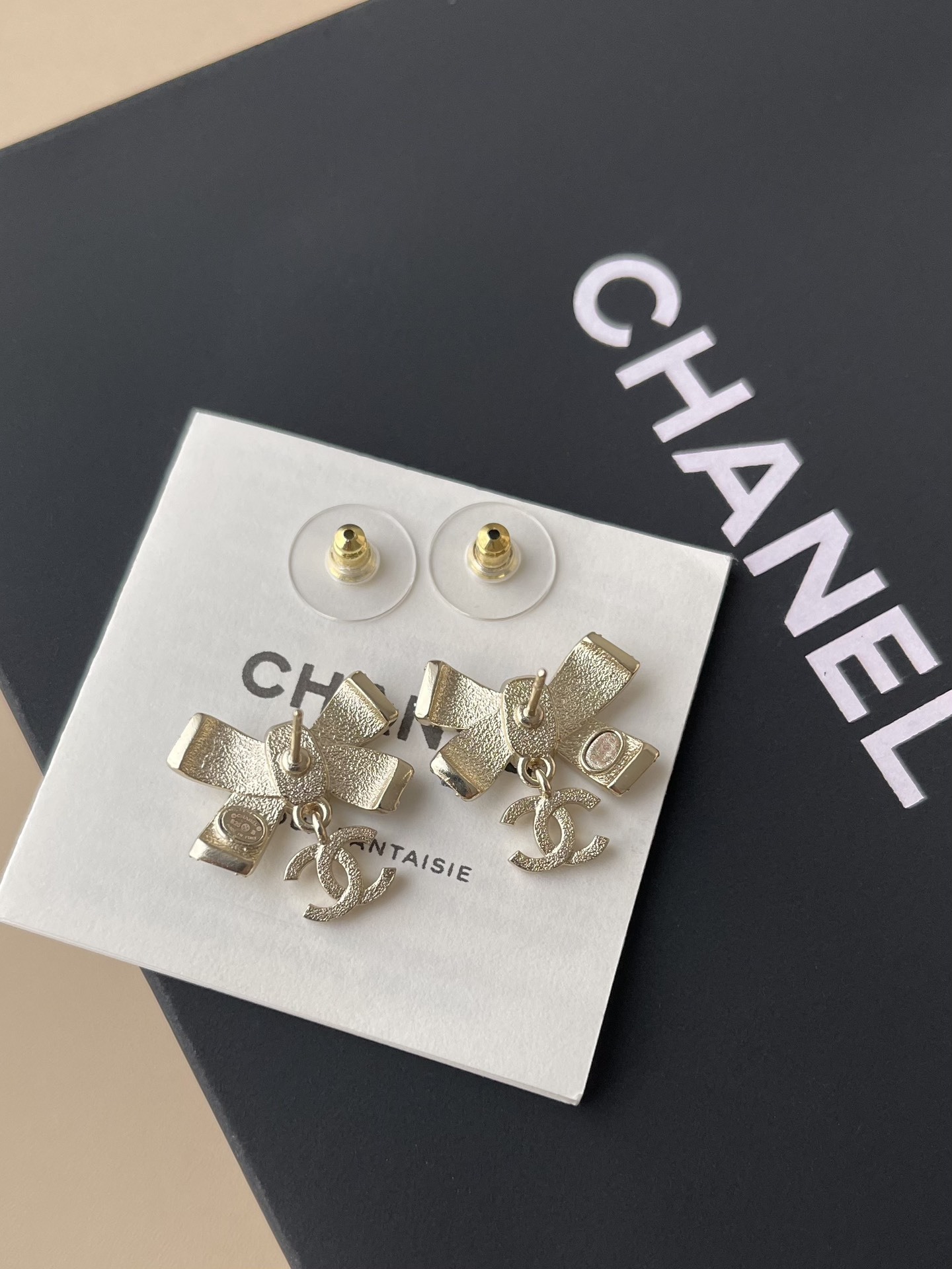 Chanel Crystal Bow Earrings with Black Enamel and CC Logo Drop