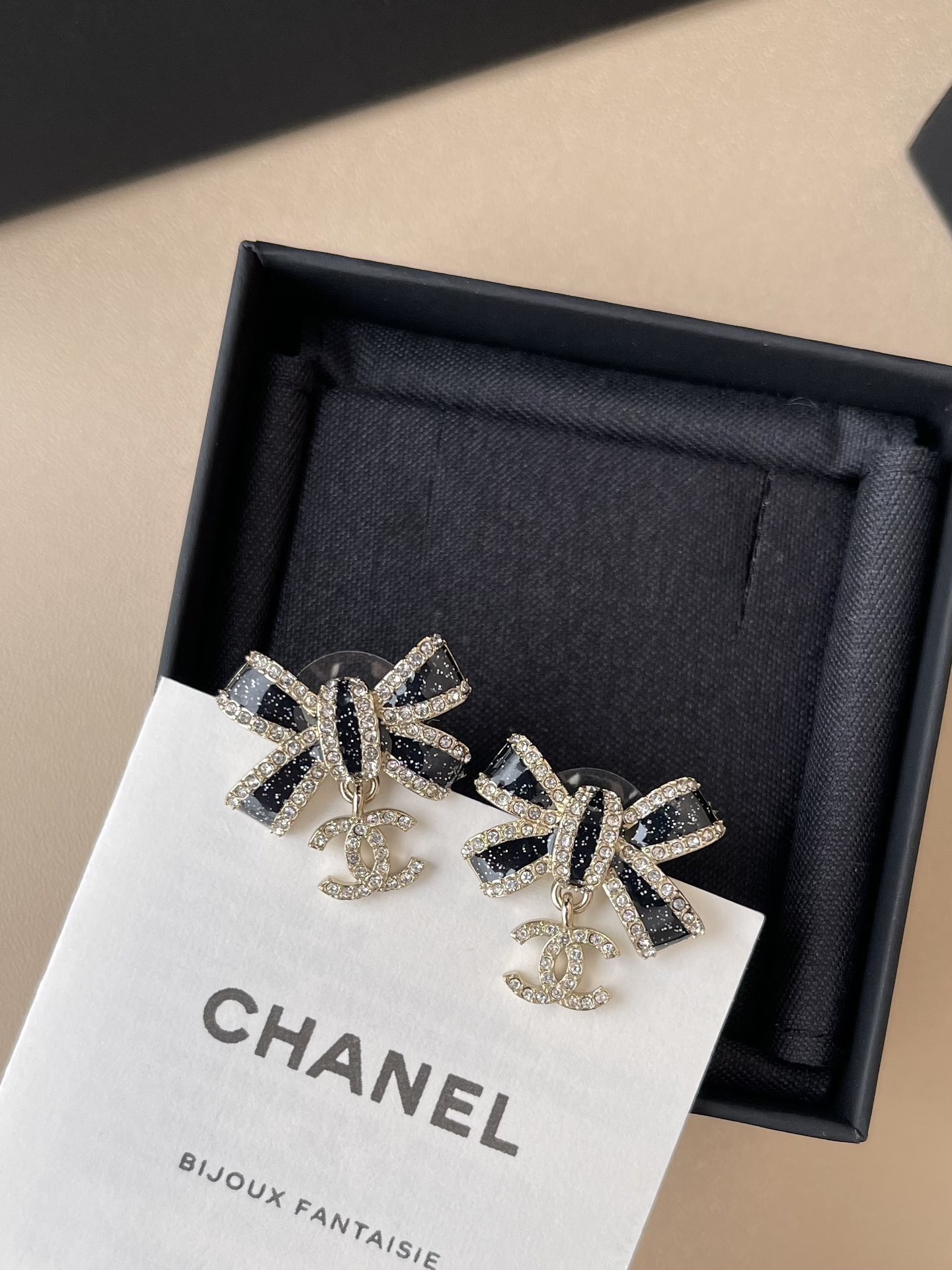 Chanel Crystal Bow Earrings with Black Enamel and CC Logo Drop