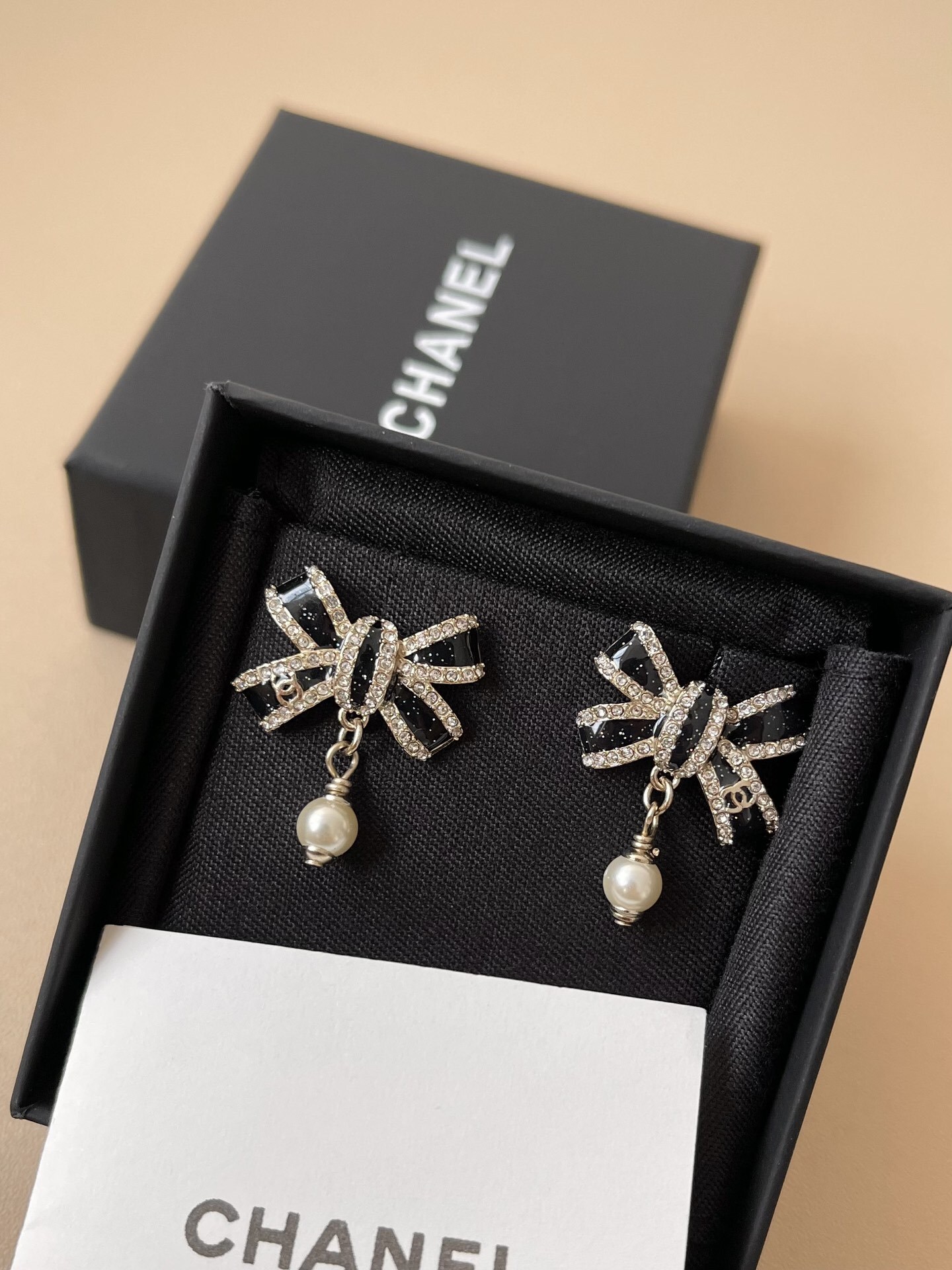 Luxury Crystal Bow Earrings with Pearl Drop & Black Enamel