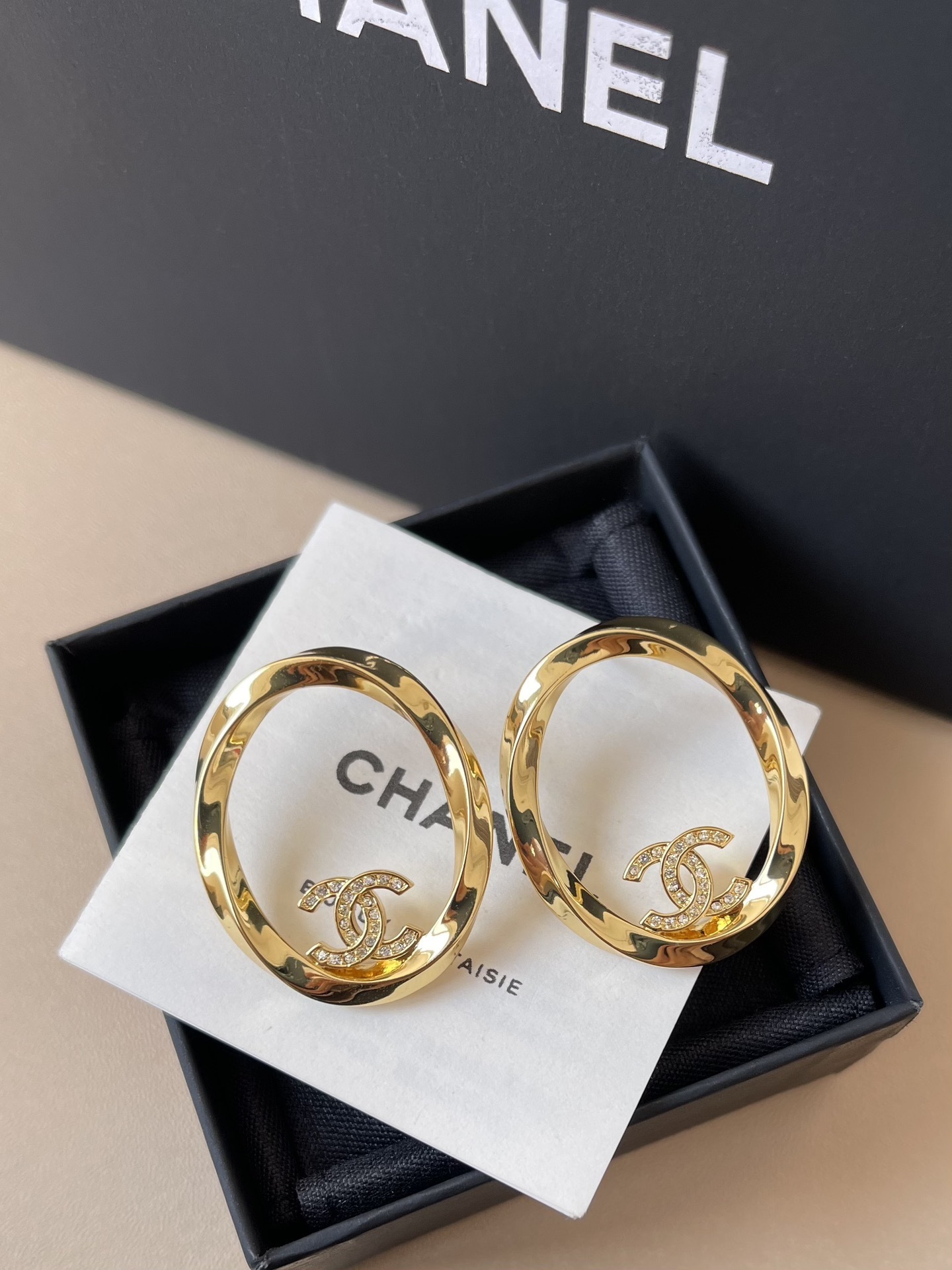 Luxury Gold-Tone Oval Hoop Earrings with Sparkling Crystal CC Logo