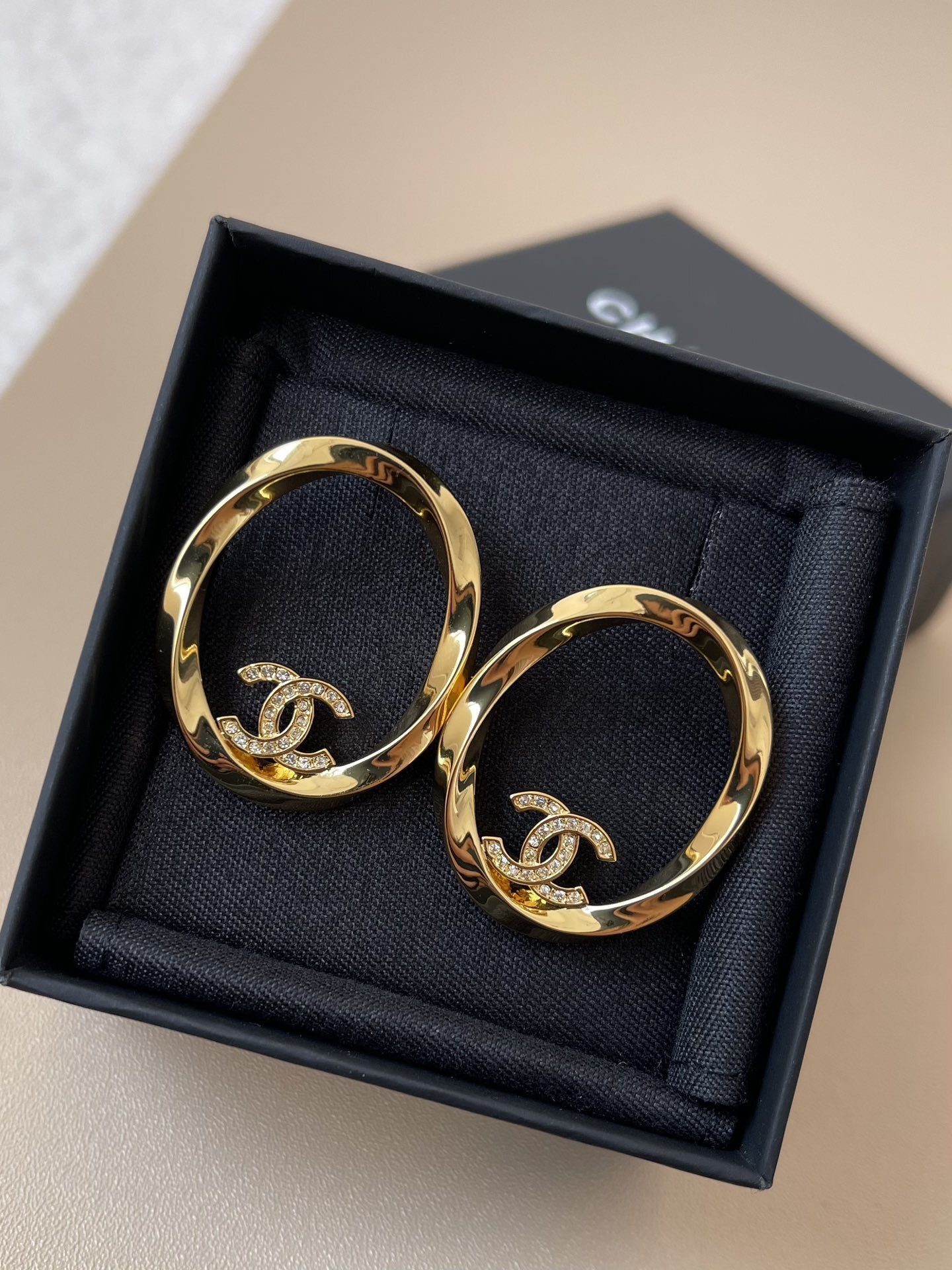 Luxury Gold-Tone Oval Hoop Earrings with Sparkling Crystal CC Logo