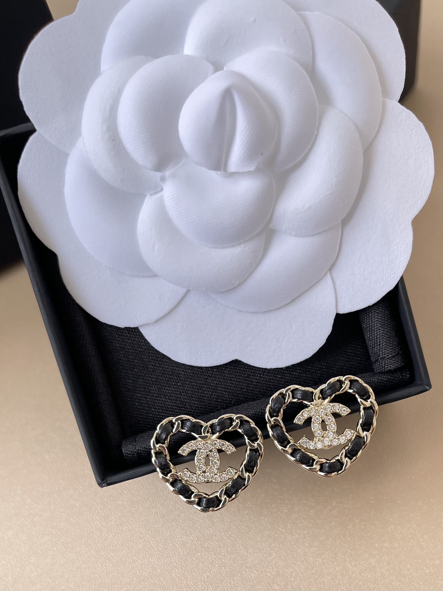 Elegant Heart-Shaped CC Logo Earrings with Gold and Black Leather