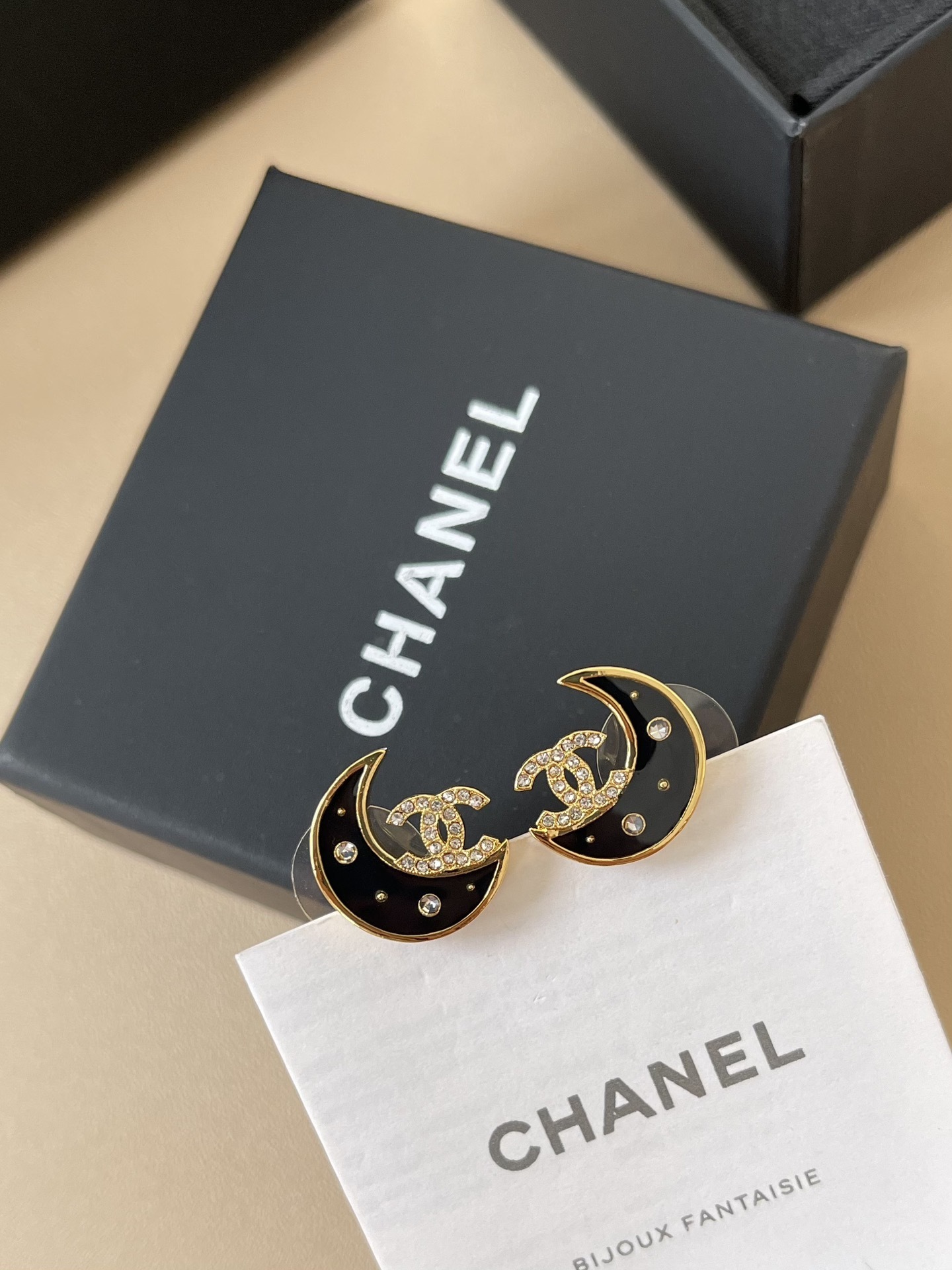 Luxury Crescent Moon Stud Earrings with Gold Logo and Crystals