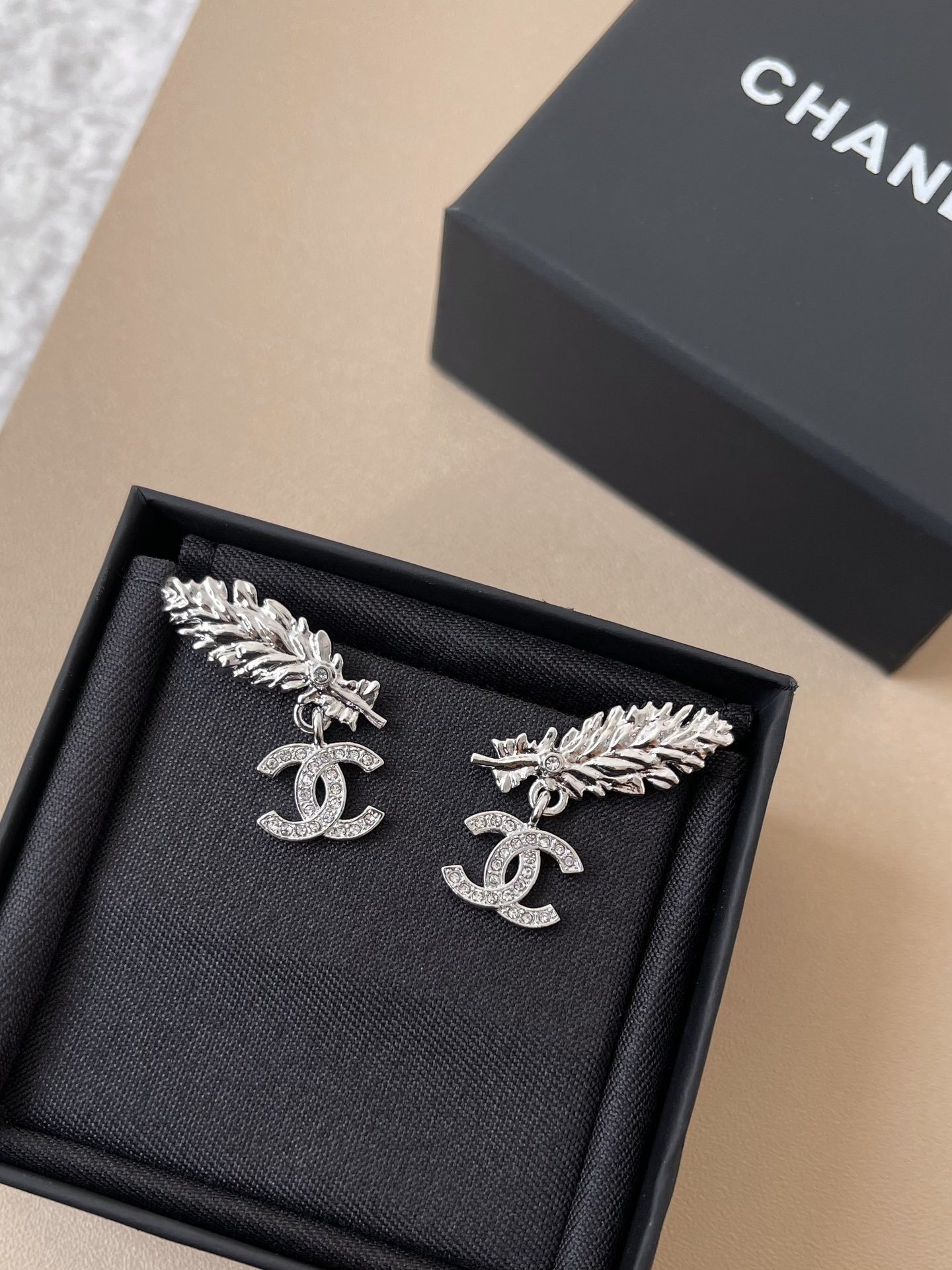 Premium Silver Feather CC Logo Crystal Drop Earrings