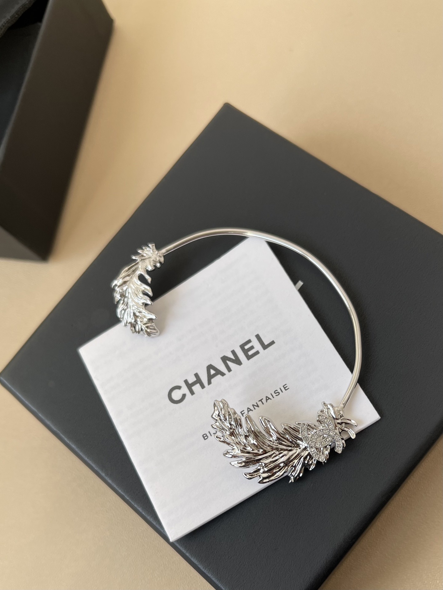 Chanel 2025 SS Crystal Leaf Ear Cuff - Silver Tone Luxury Jewelry