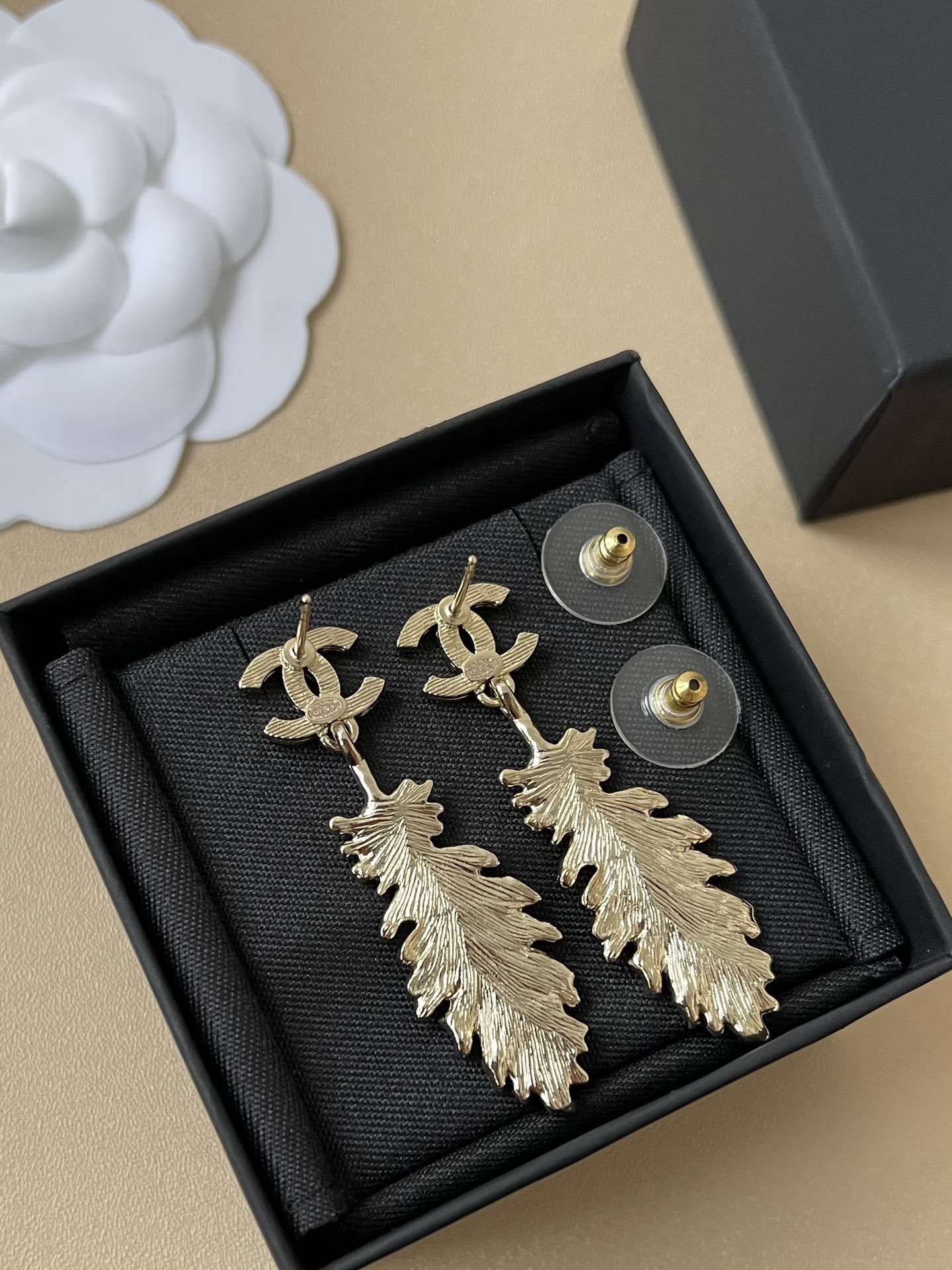 Chanel 2025 SS CC Logo Crystal Feather Pendant Drop Earrings