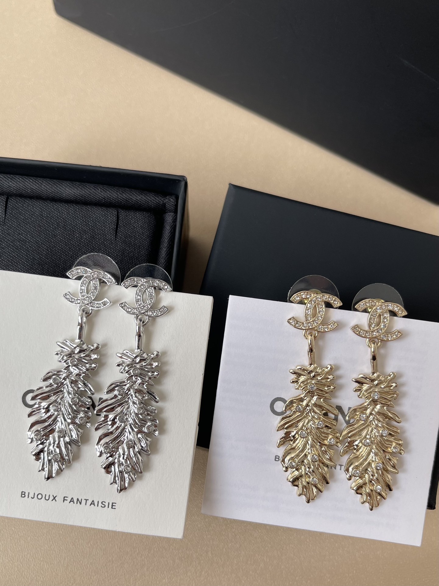 Chanel 2025 SS CC Logo Crystal Feather Pendant Drop Earrings