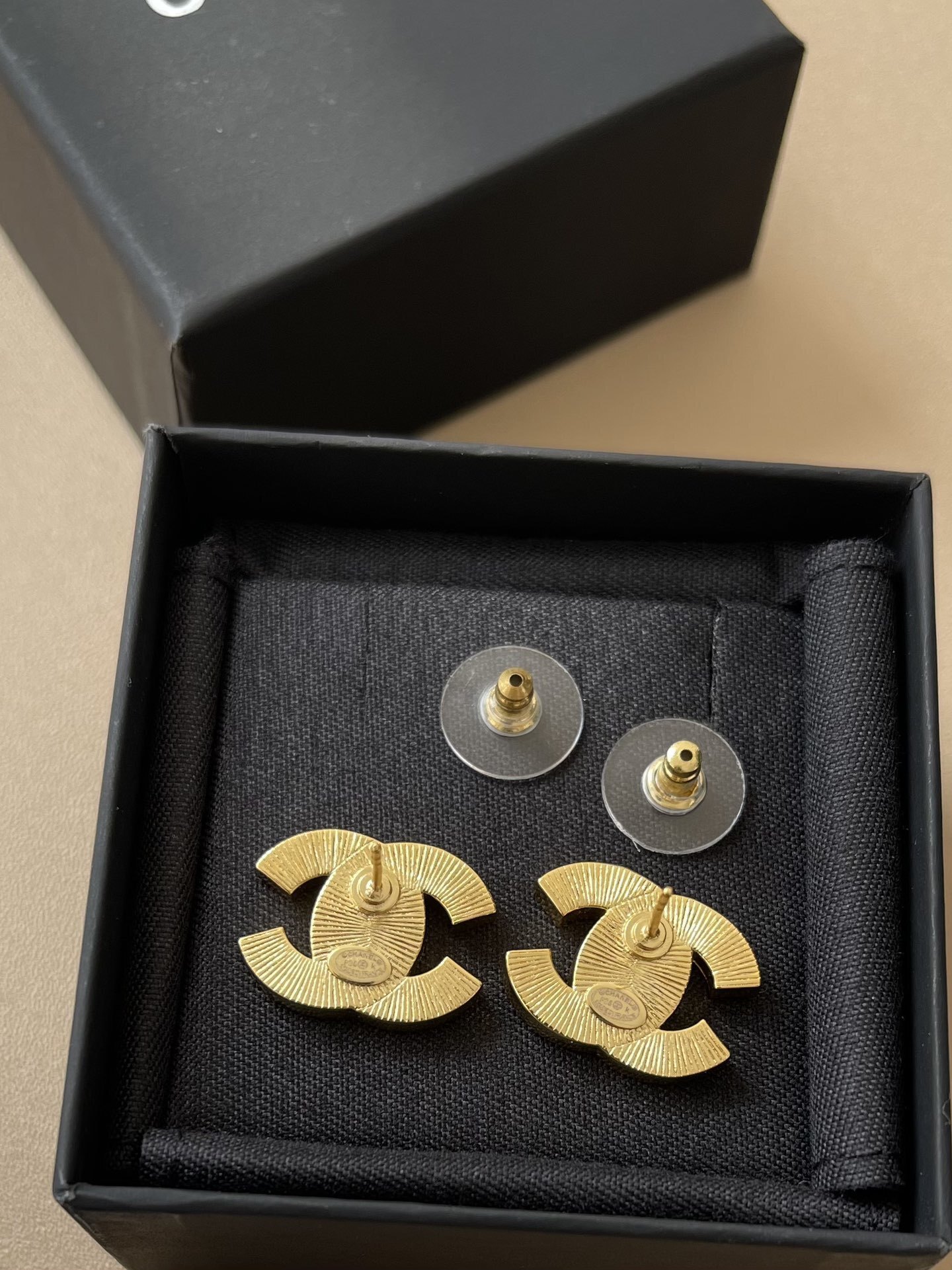 Elegant Black Enamel CC Logo Stud Earrings with Gold Trim