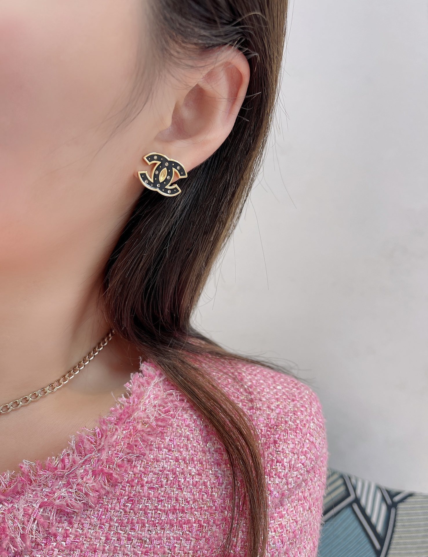 Elegant Black Enamel CC Logo Stud Earrings with Gold Trim