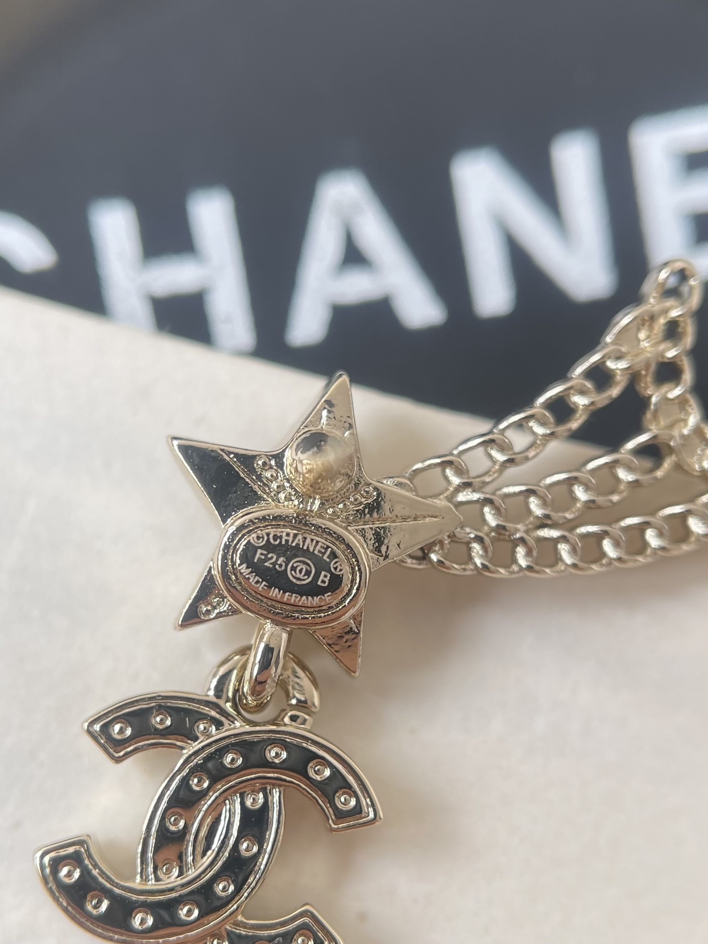 Chanel Gold Crystal Shooting Star & Double C Logo Dangle Earrings