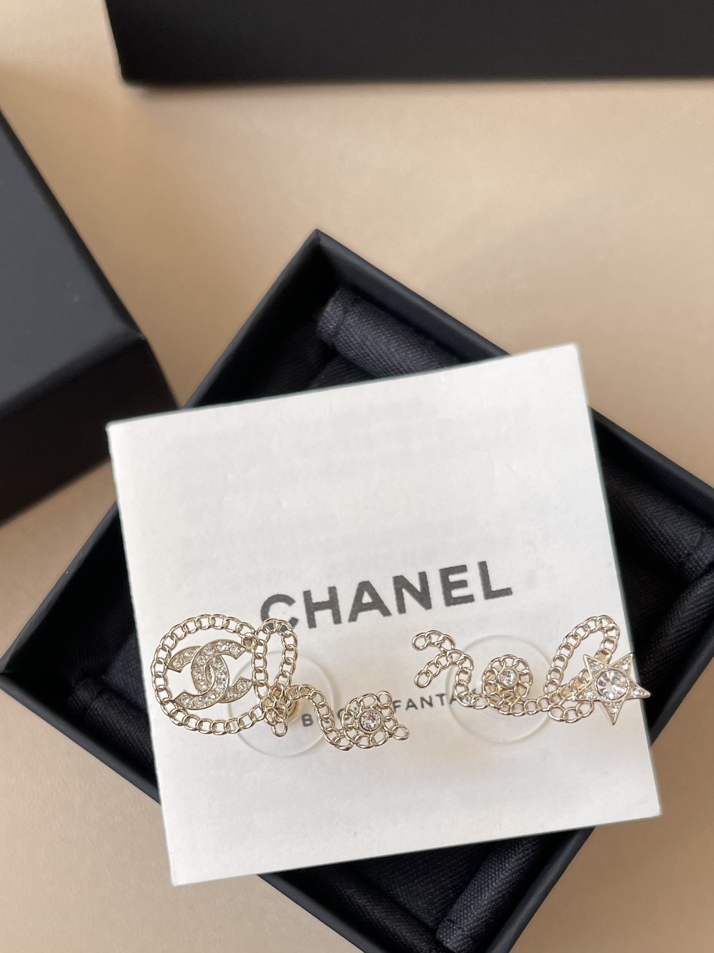 Chanel Gold-Tone Crystal Chain Script Earrings - Elegant Jewelry