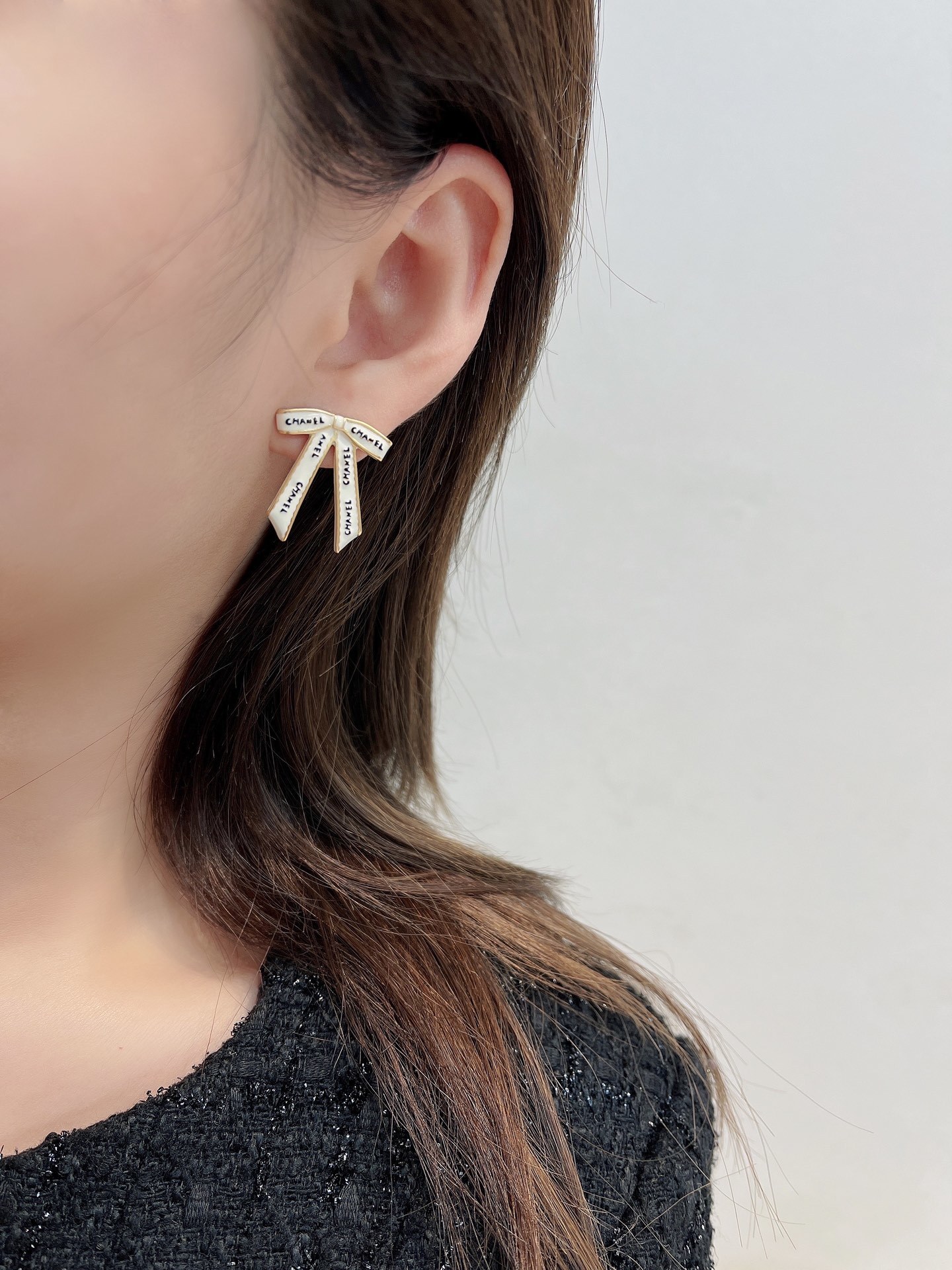 Chanel White Ribbon Bow Stud Earrings – Elegant Gold-Tone Jewelry