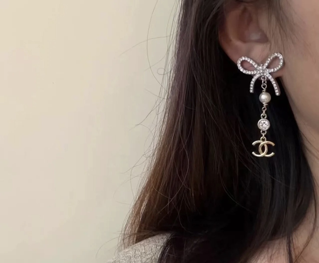 Luxury Chanel Silver Ribbon Bow Crystal Pearl CC Logo Drop Earrings