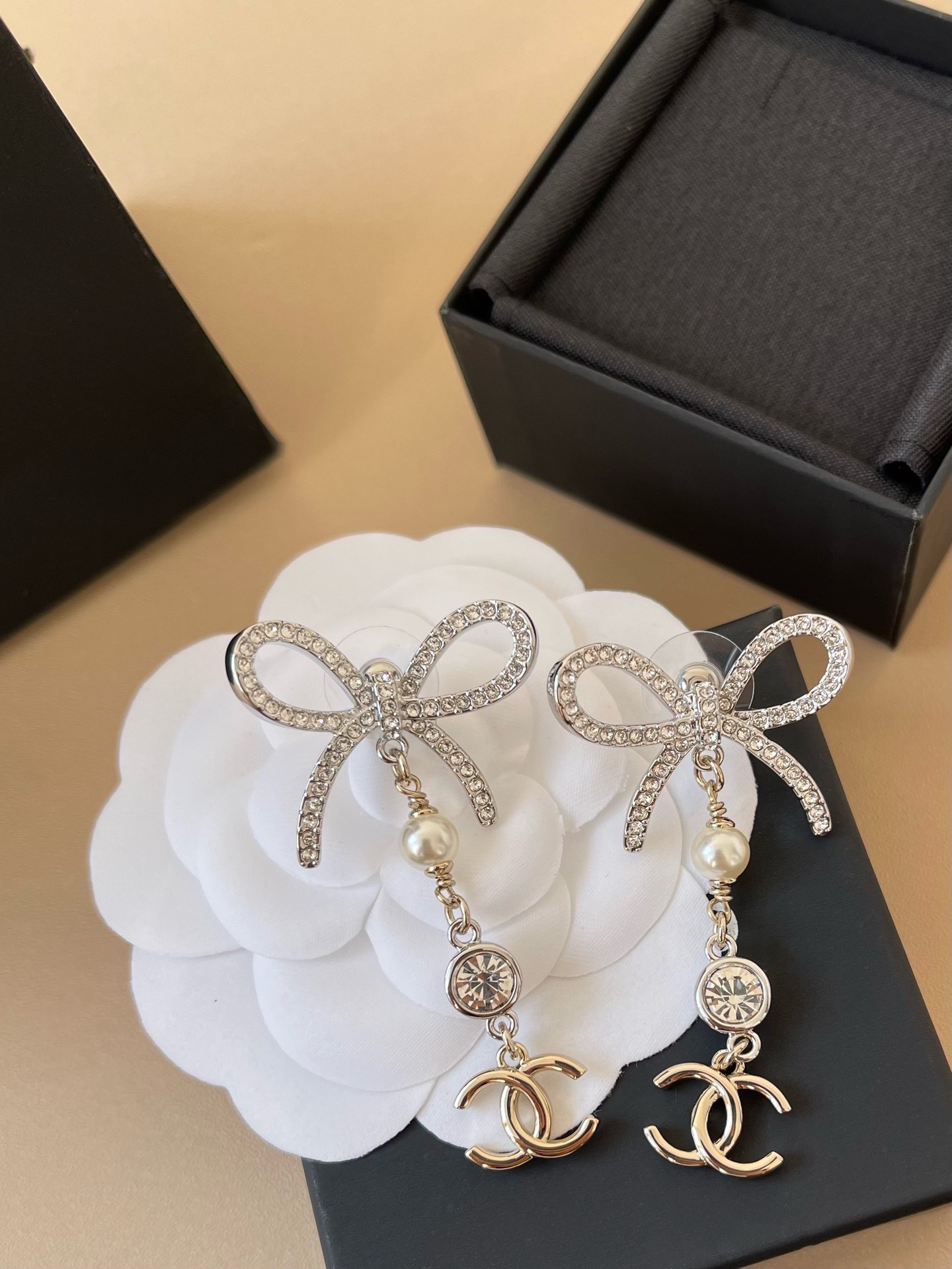 Luxury Chanel Silver Ribbon Bow Crystal Pearl CC Logo Drop Earrings