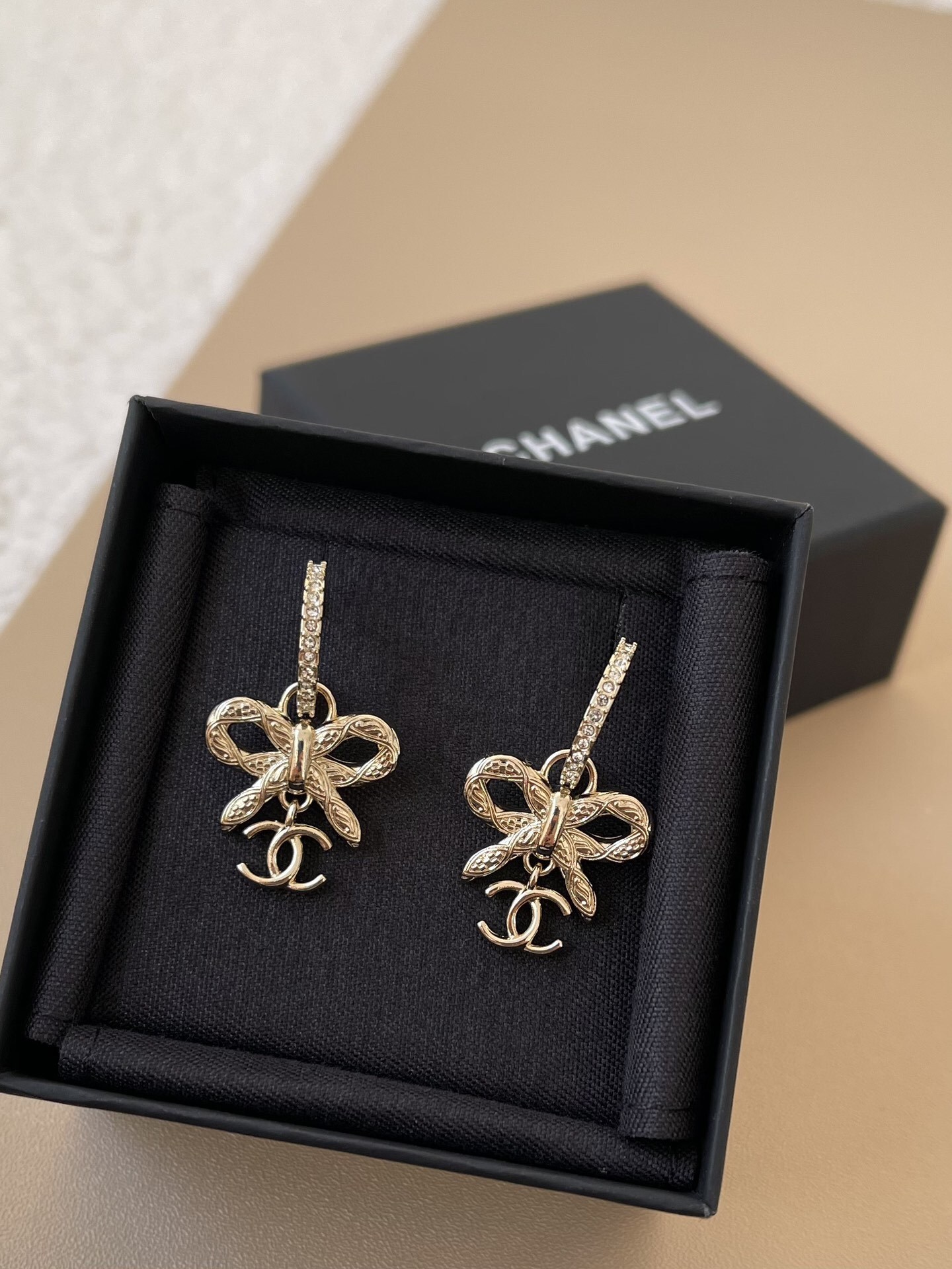 Luxury Gold Bow & CC Logo Earrings - Elegant Crystal Dangle Studs