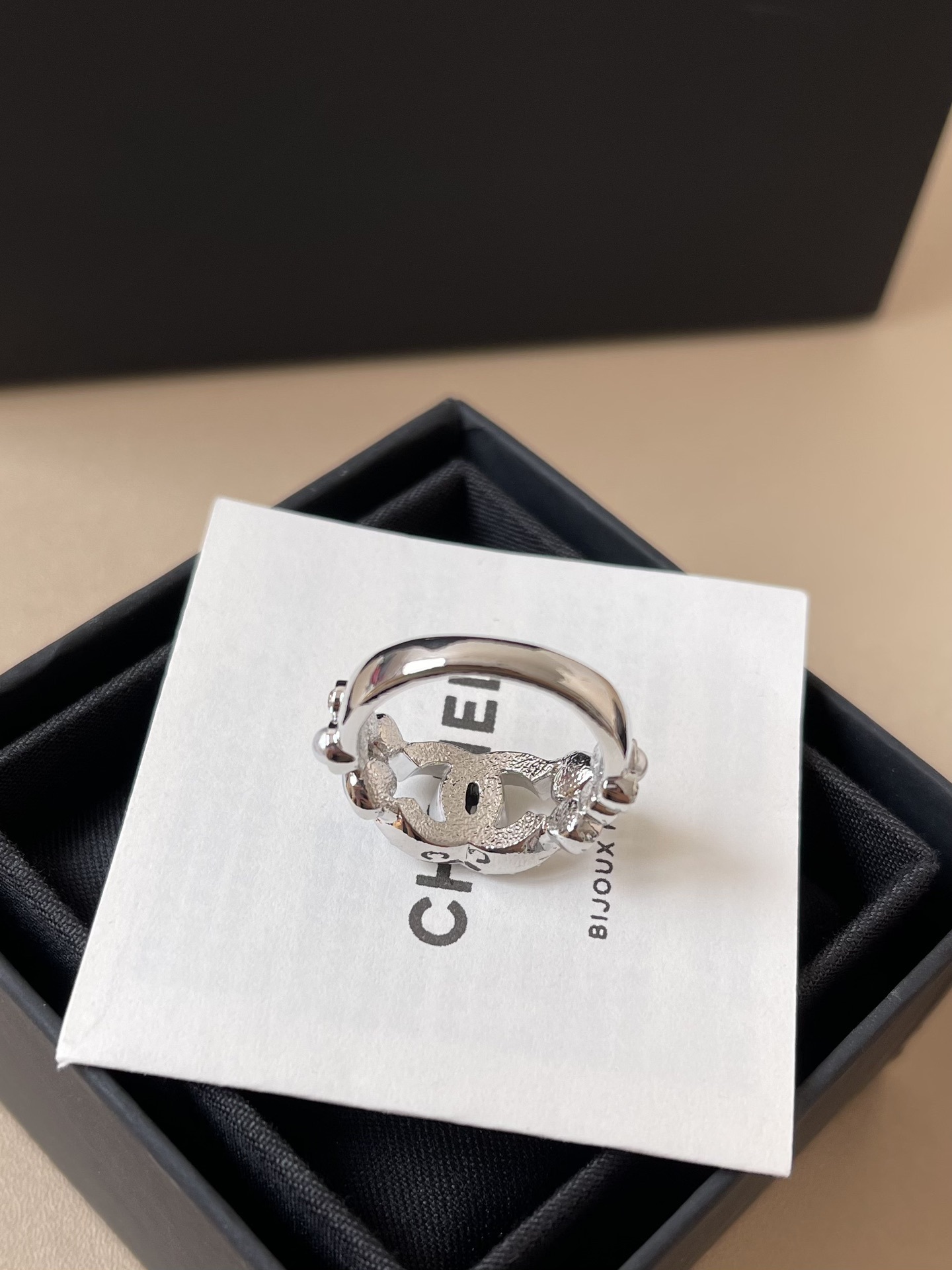 Elegant Interlocking CC Crystal Ring with Pearl & Blue Accents