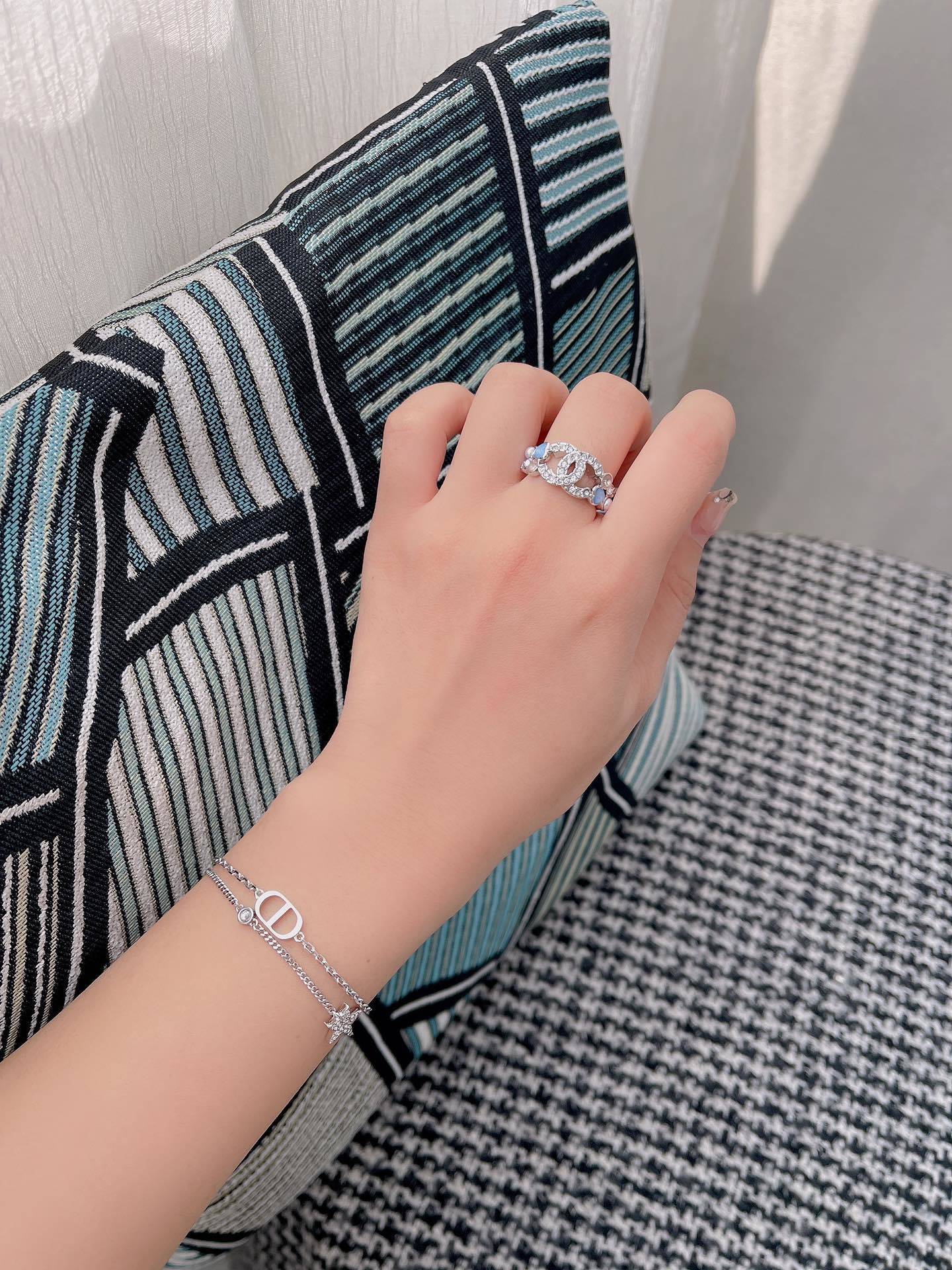 Elegant Interlocking CC Crystal Ring with Pearl & Blue Accents