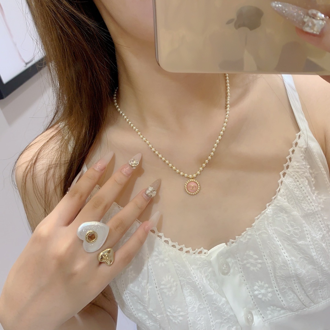 Chanel Luxury Double Heart Ring – Gold Finish & White Pearl CC Logo