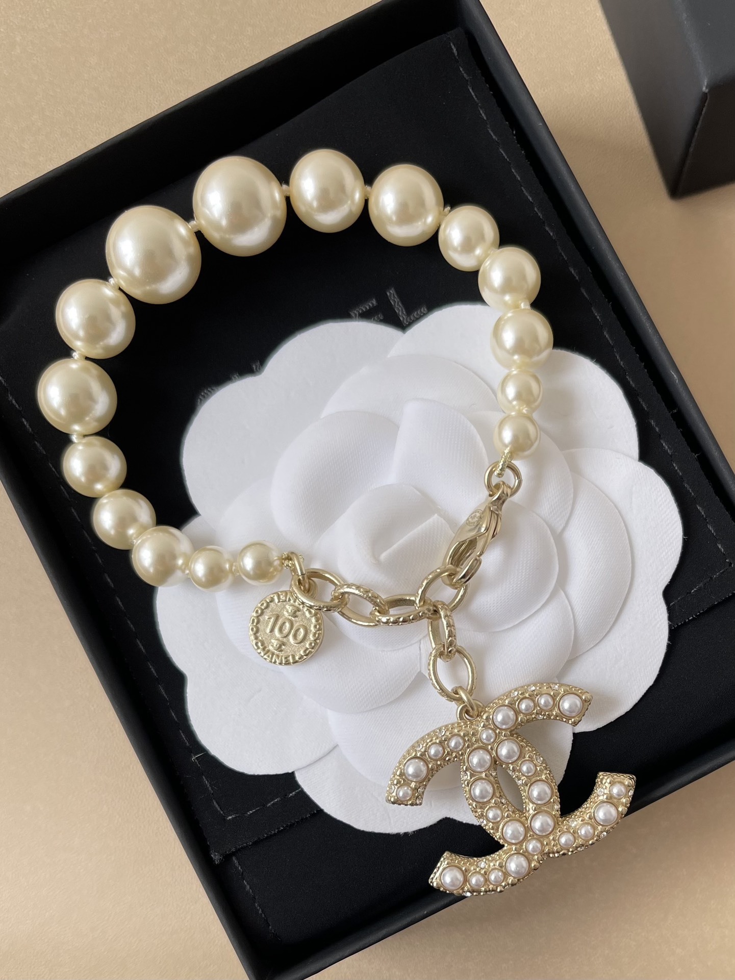 Luxury Chanel CC Logo Pearl Bracelet - Elegant Gold Charm Jewelry