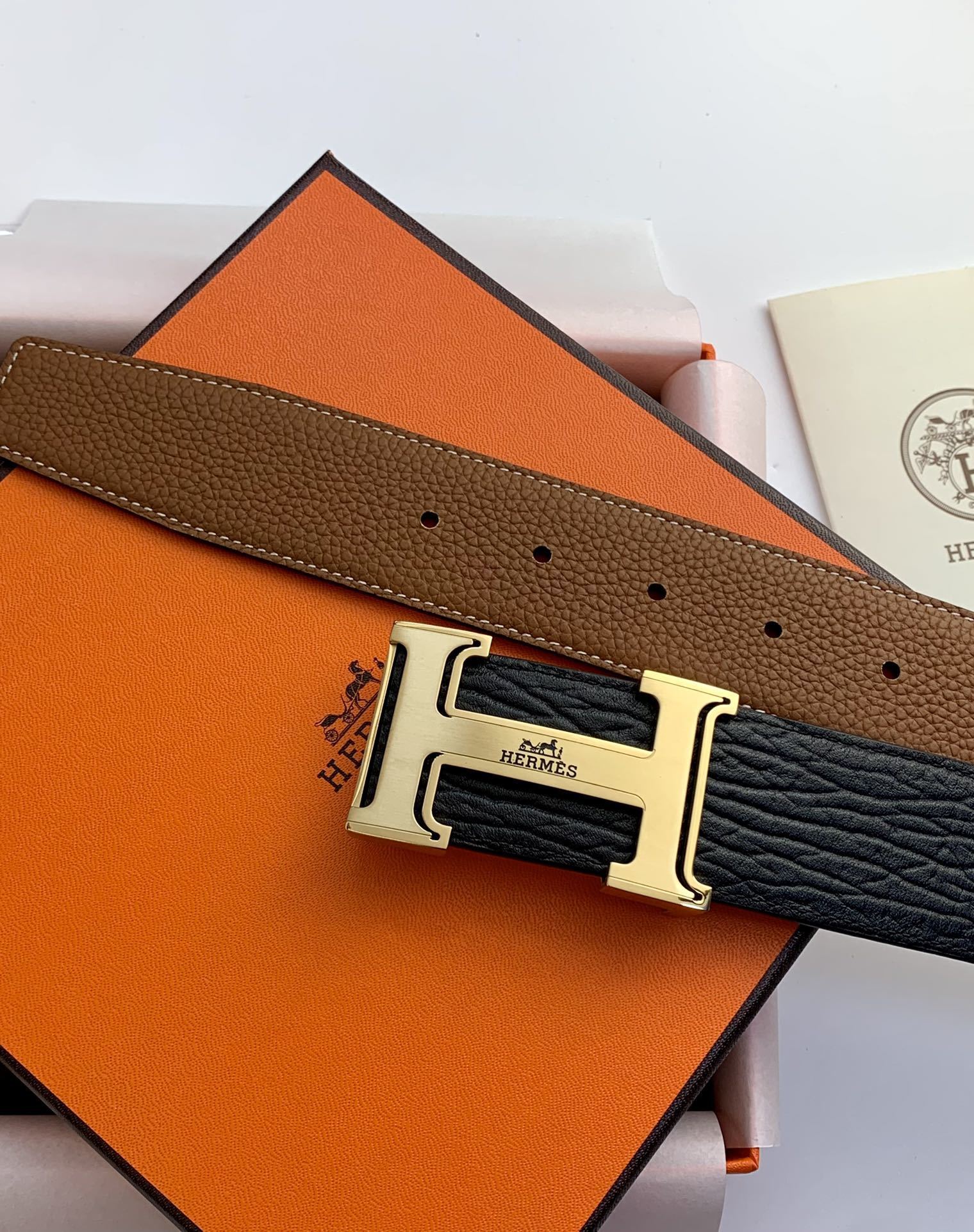 Hermès Reversible H Buckle Leather Belt – Black and Gold