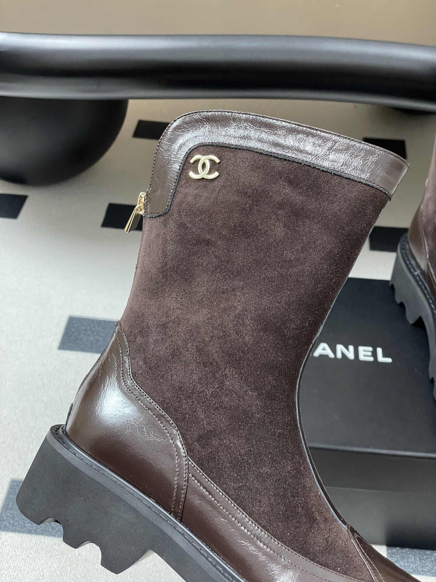 Pair of Chanel dark brown suede and leather mid-calf boots with chunky black lug soles and gold CC logo. - Hình 8