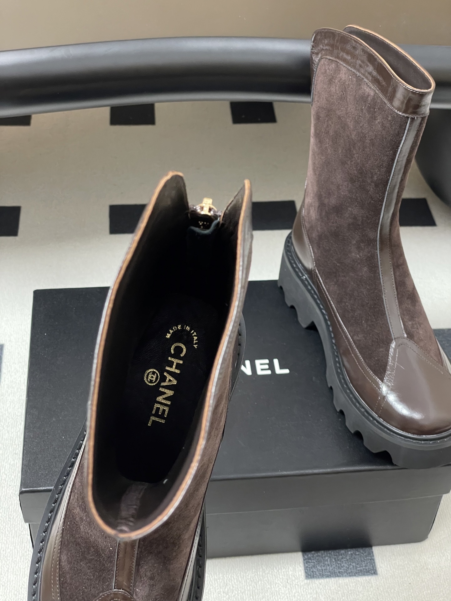 Pair of Chanel dark brown suede and leather mid-calf boots with chunky black lug soles and gold CC logo. - Hình 6