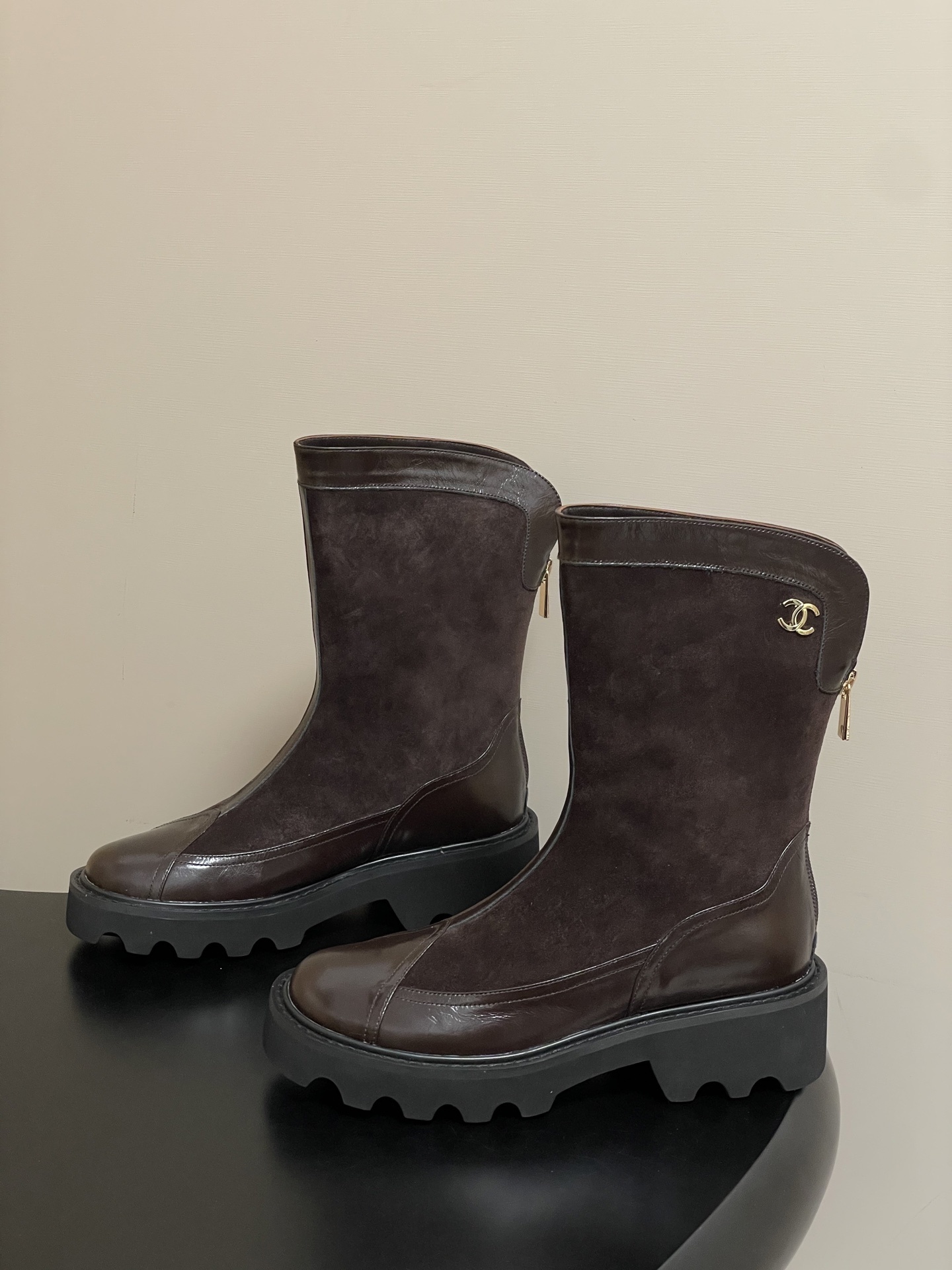 Pair of Chanel dark brown suede and leather mid-calf boots with chunky black lug soles and gold CC logo. - Hình 3