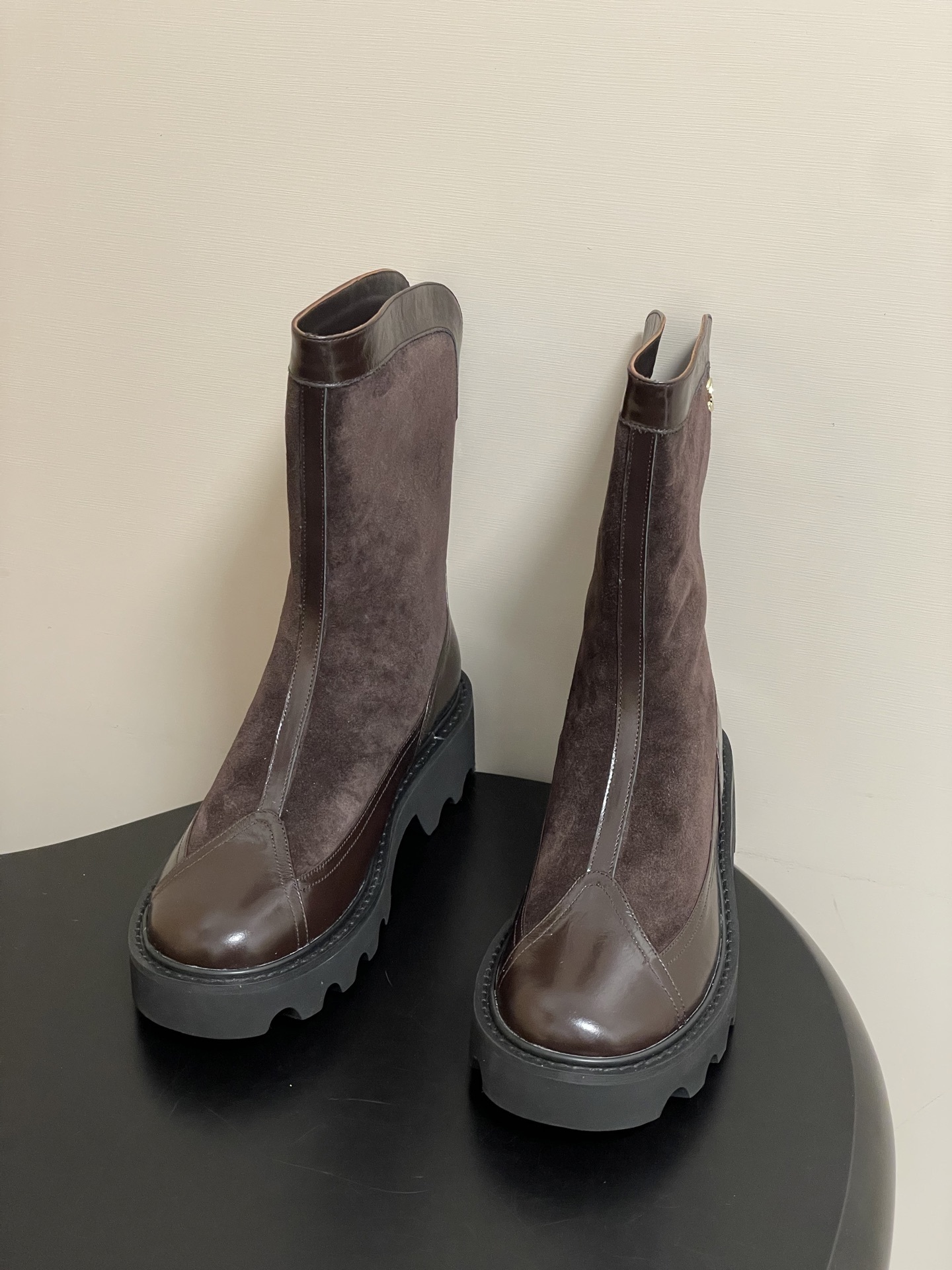 Pair of Chanel dark brown suede and leather mid-calf boots with chunky black lug soles and gold CC logo. - Hình 2