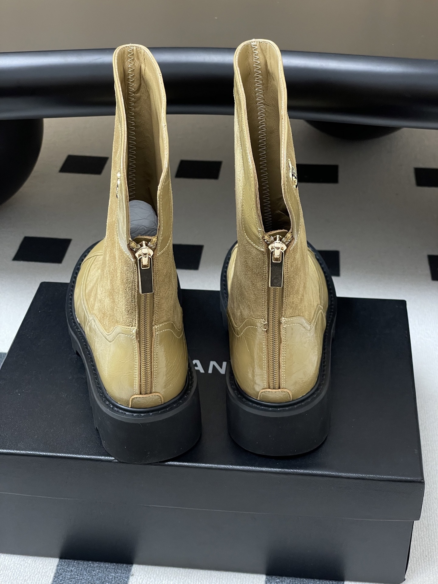 Pair of Chanel beige suede and patent leather mid-calf boots with black chunky lug soles and gold CC logo - Hình 9