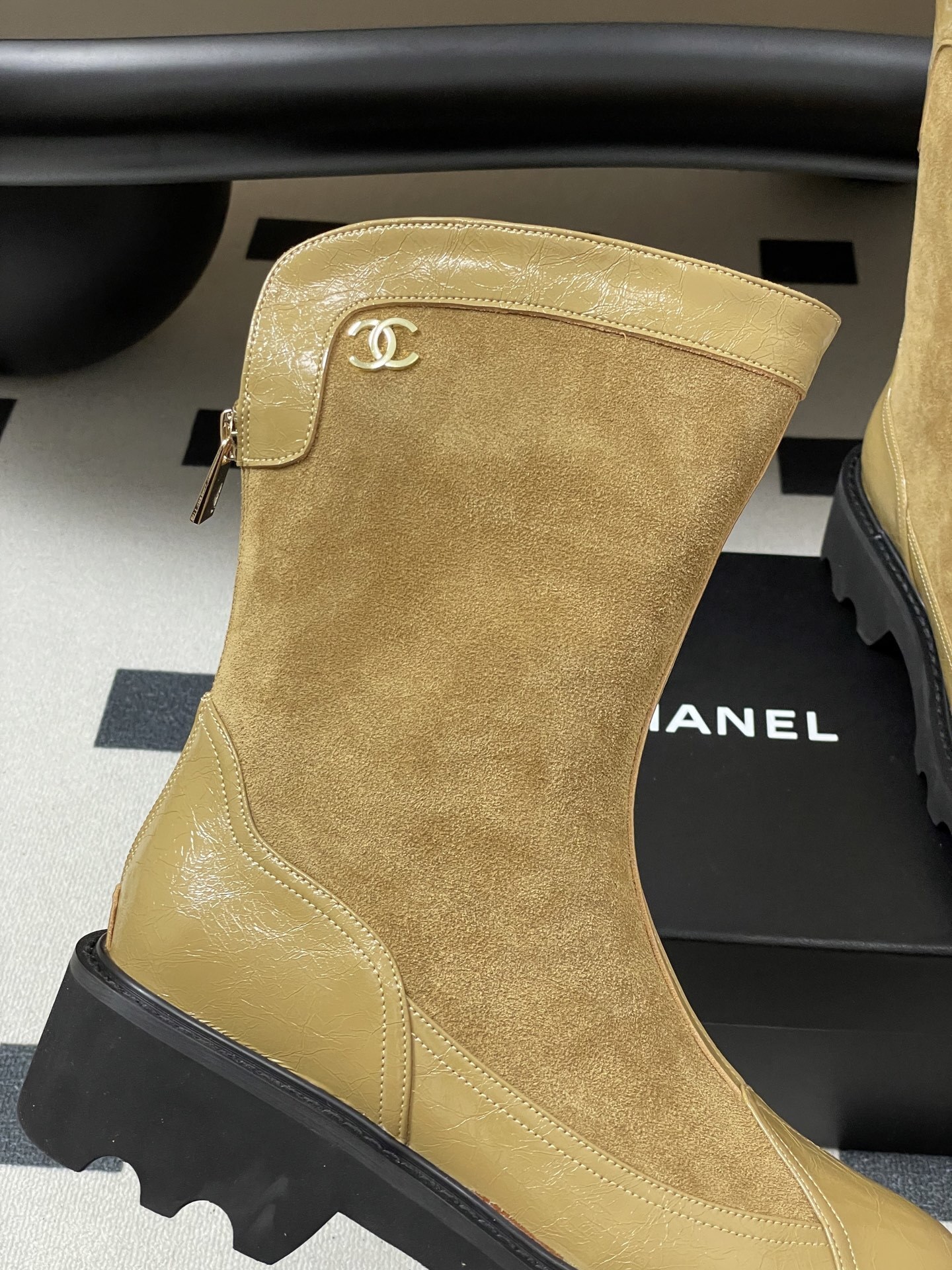 Pair of Chanel beige suede and patent leather mid-calf boots with black chunky lug soles and gold CC logo - Hình 8