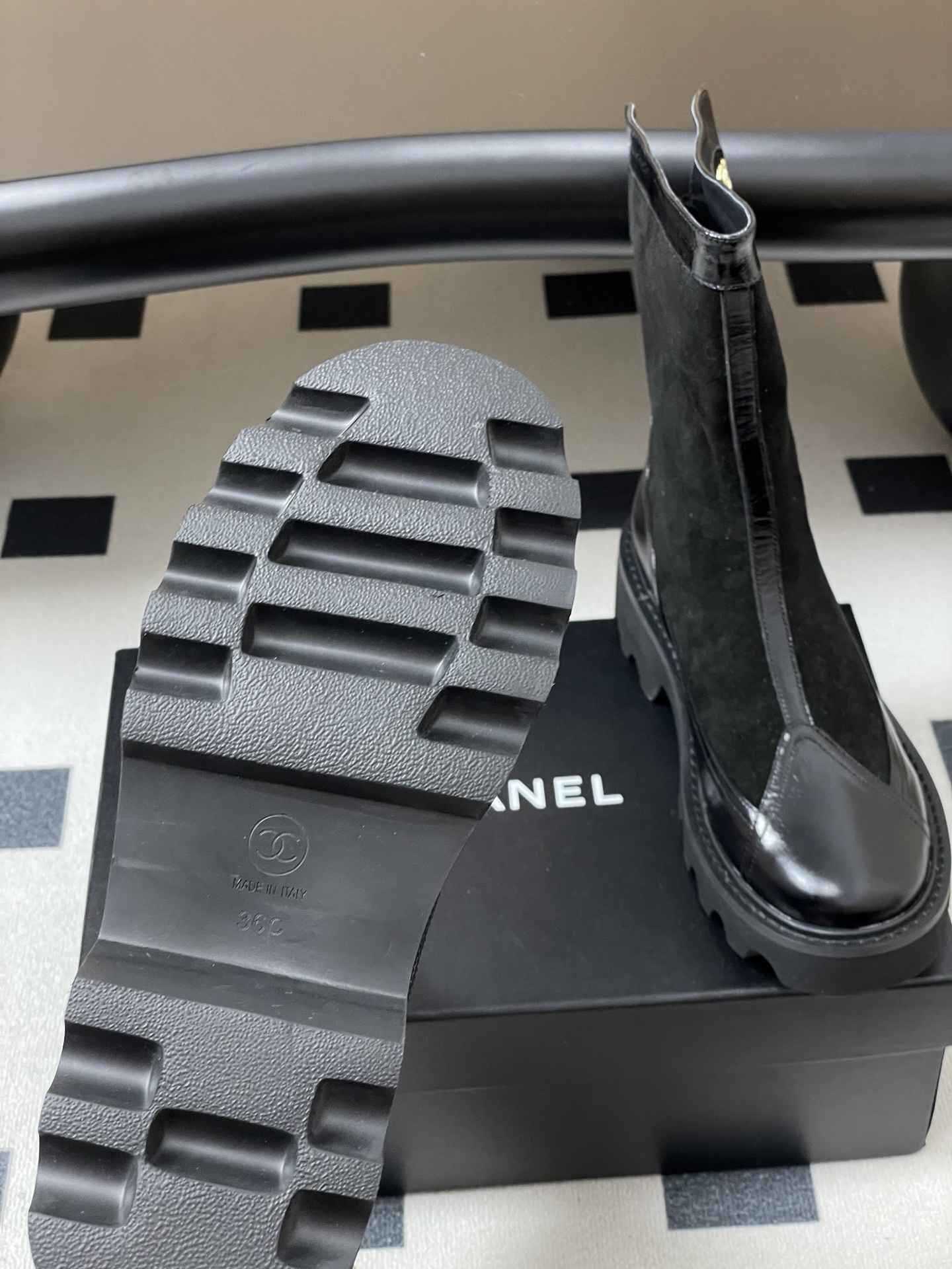 Pair of Chanel black suede and patent leather mid-calf boots with chunky lug soles and gold CC logo detail. - Hình 7