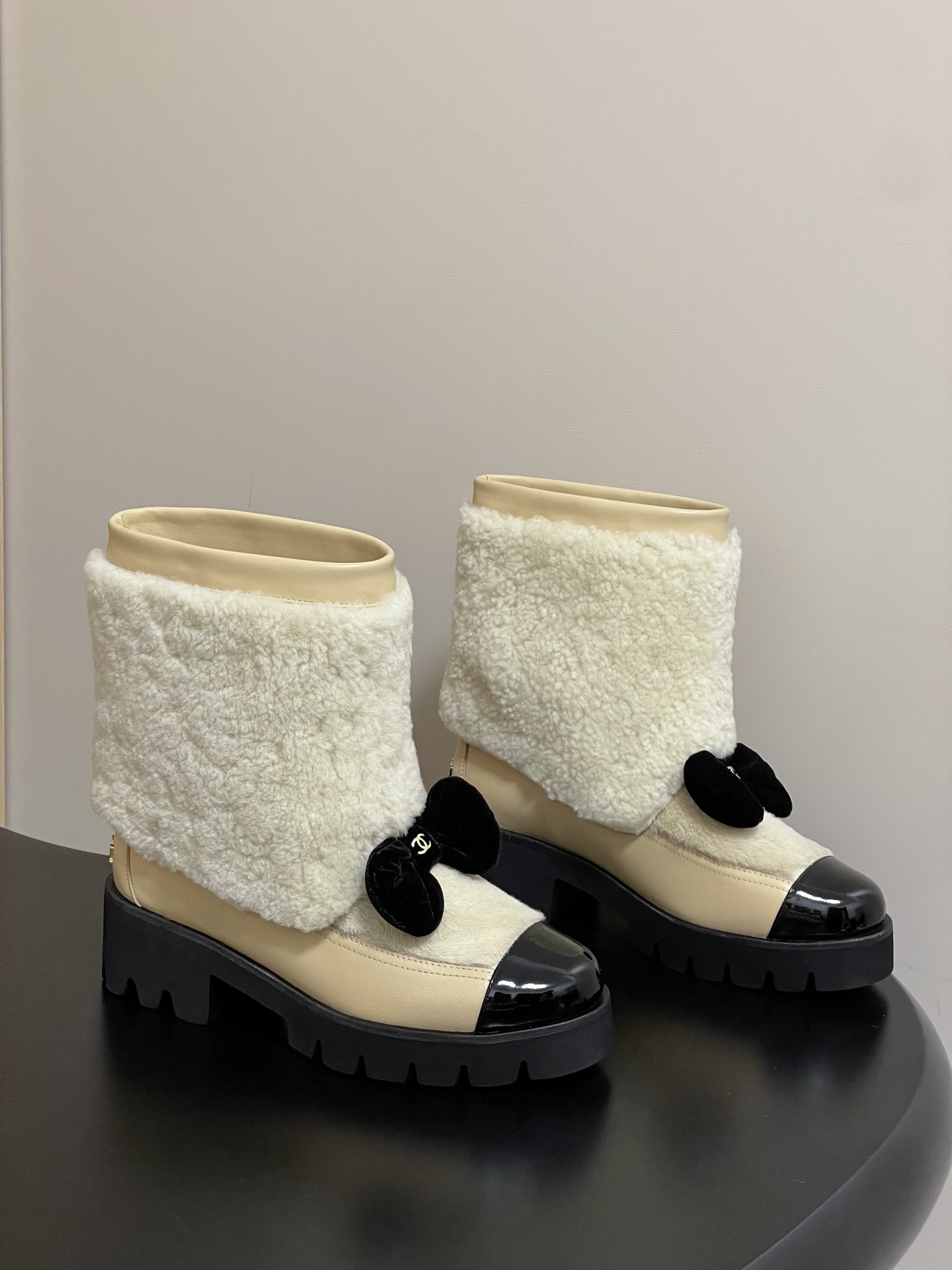 Luxury Chanel Shearling Ankle Boots with Patent Toe & Velvet Bow