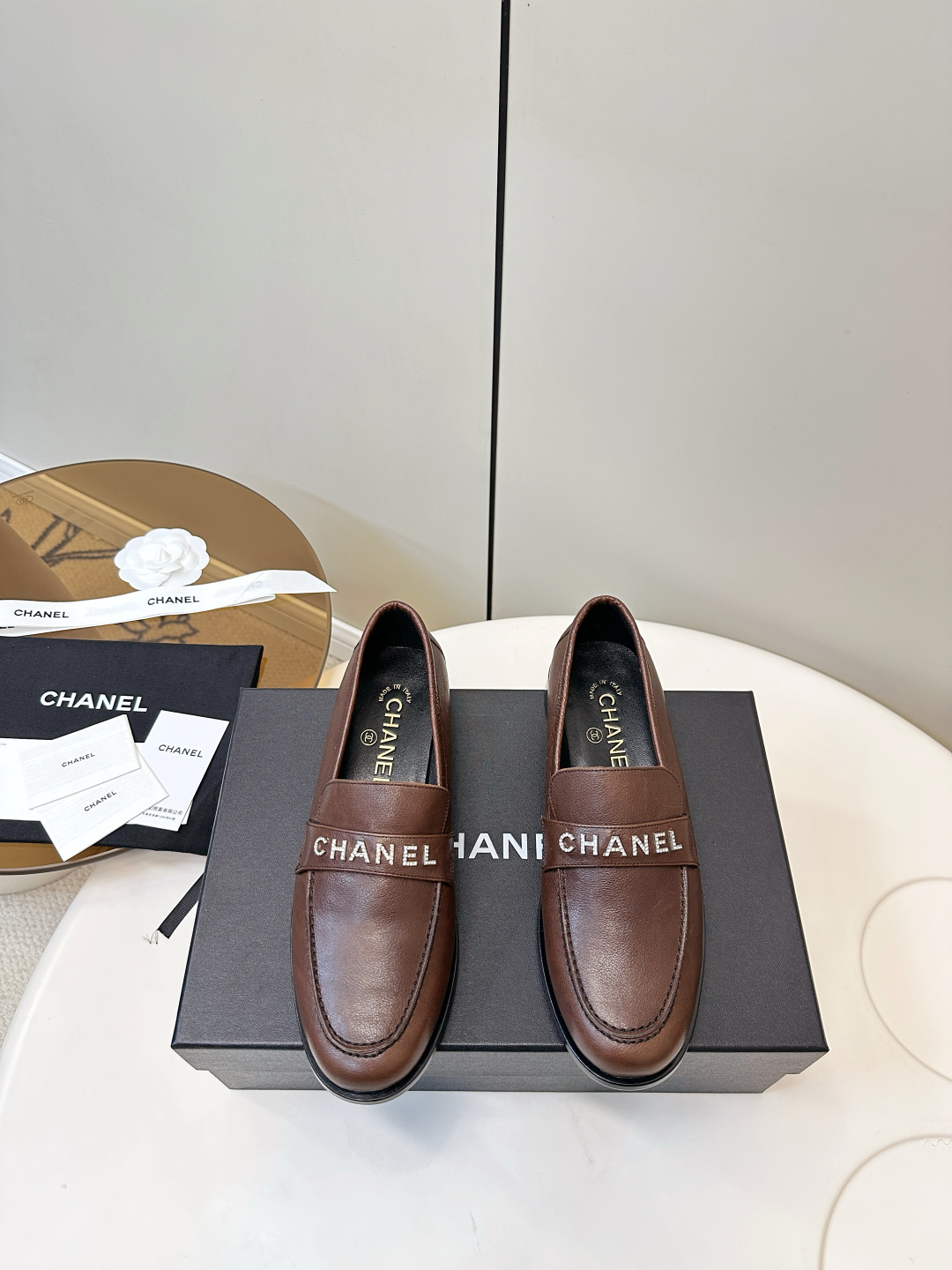 Chanel Brown Leather Loafers with Crystal Logo Lettering
