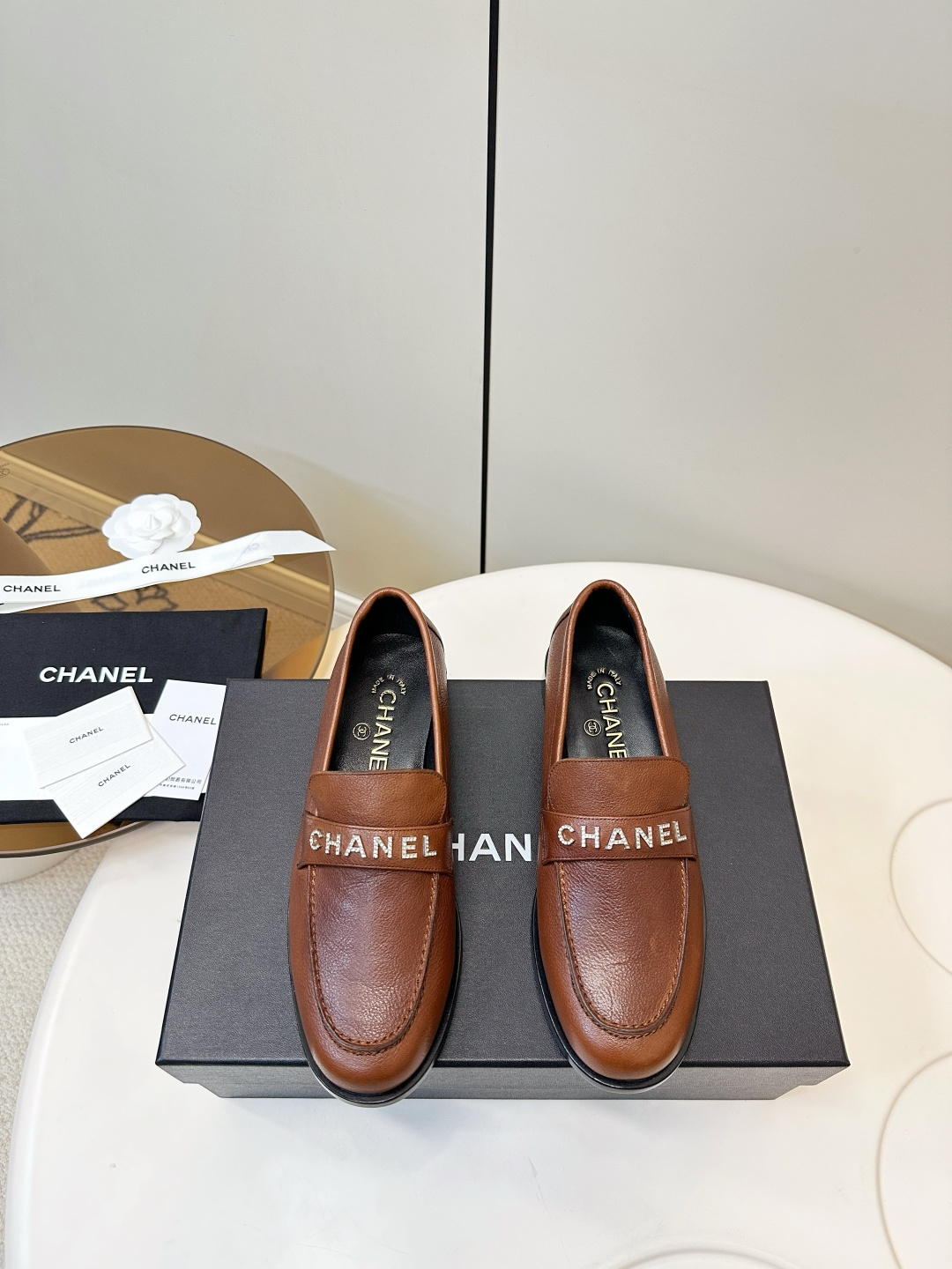 Chanel Brown Leather Loafers with Crystal Logo Detail