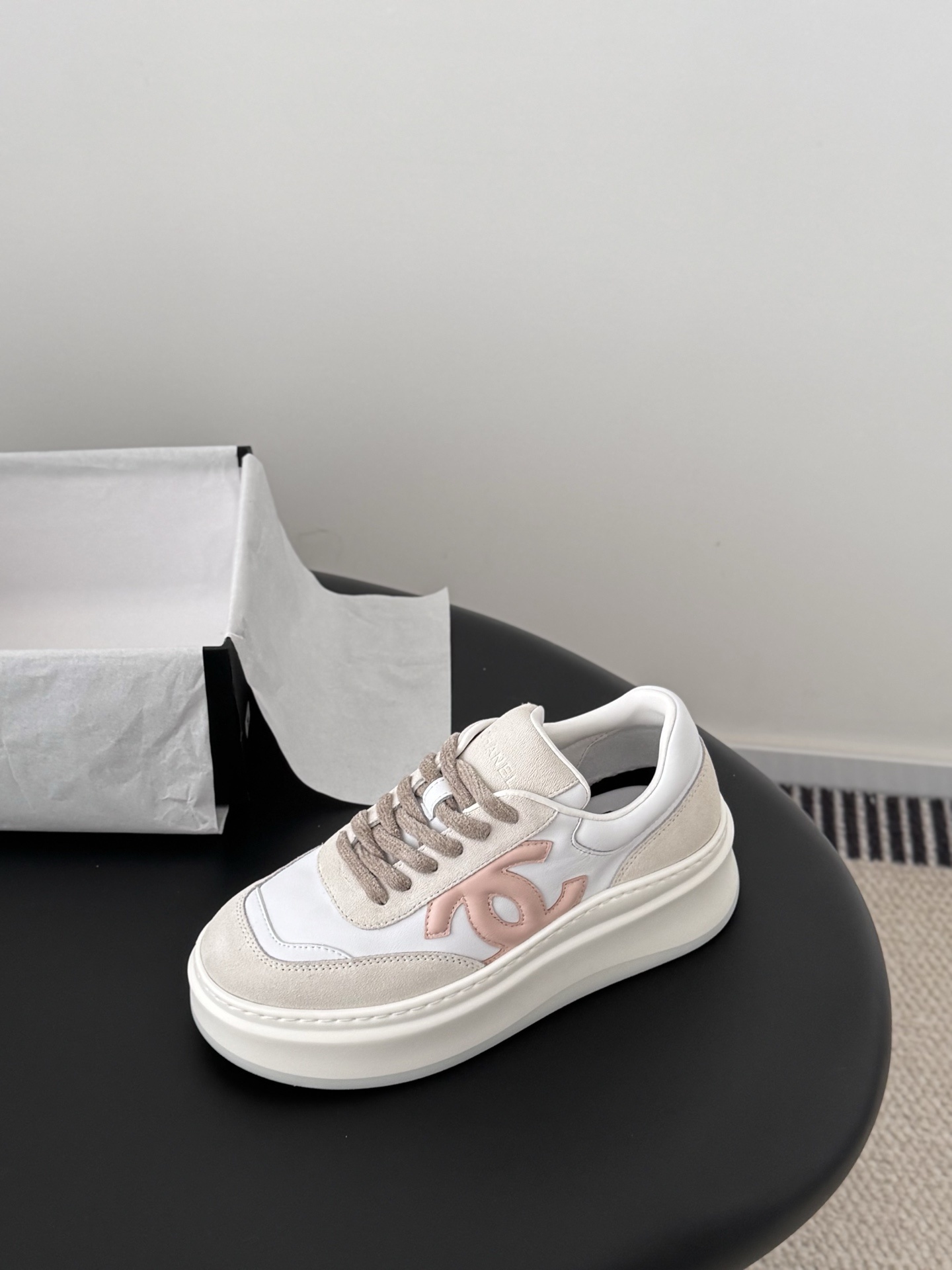 A pair of Chanel white and cream leather platform sneakers with pink interlocking C logo and original black box. - Hình 6