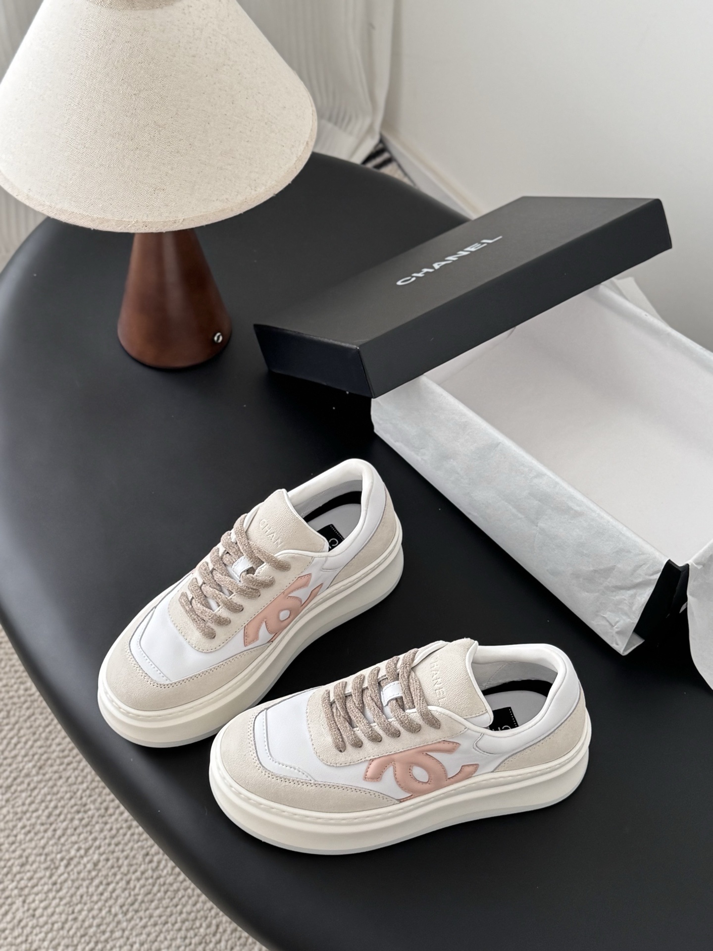 A pair of Chanel white and cream leather platform sneakers with pink interlocking C logo and original black box. - Hình 5