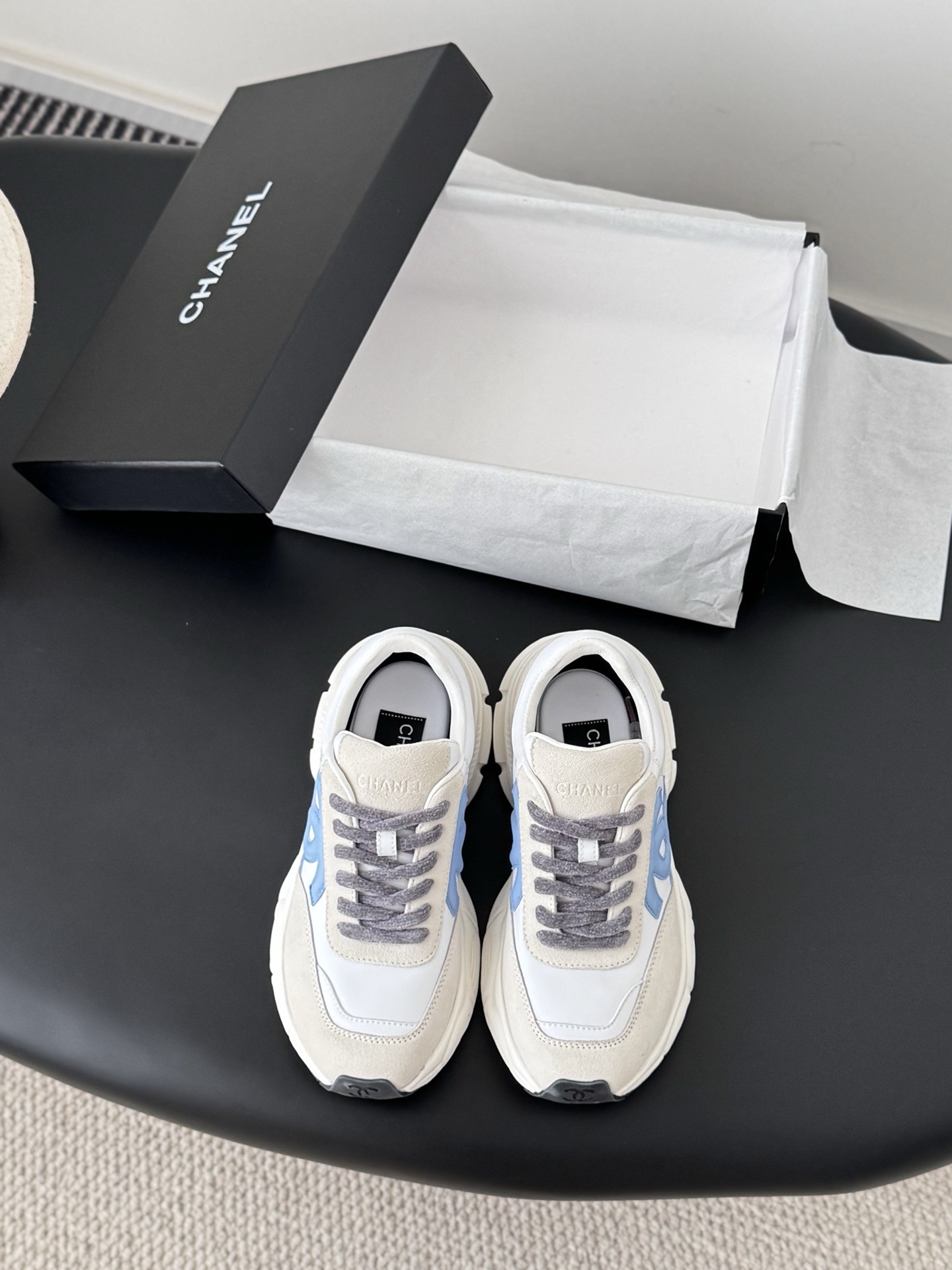 Chanel White and Light Blue Leather Sneakers – Luxury Sporty Style