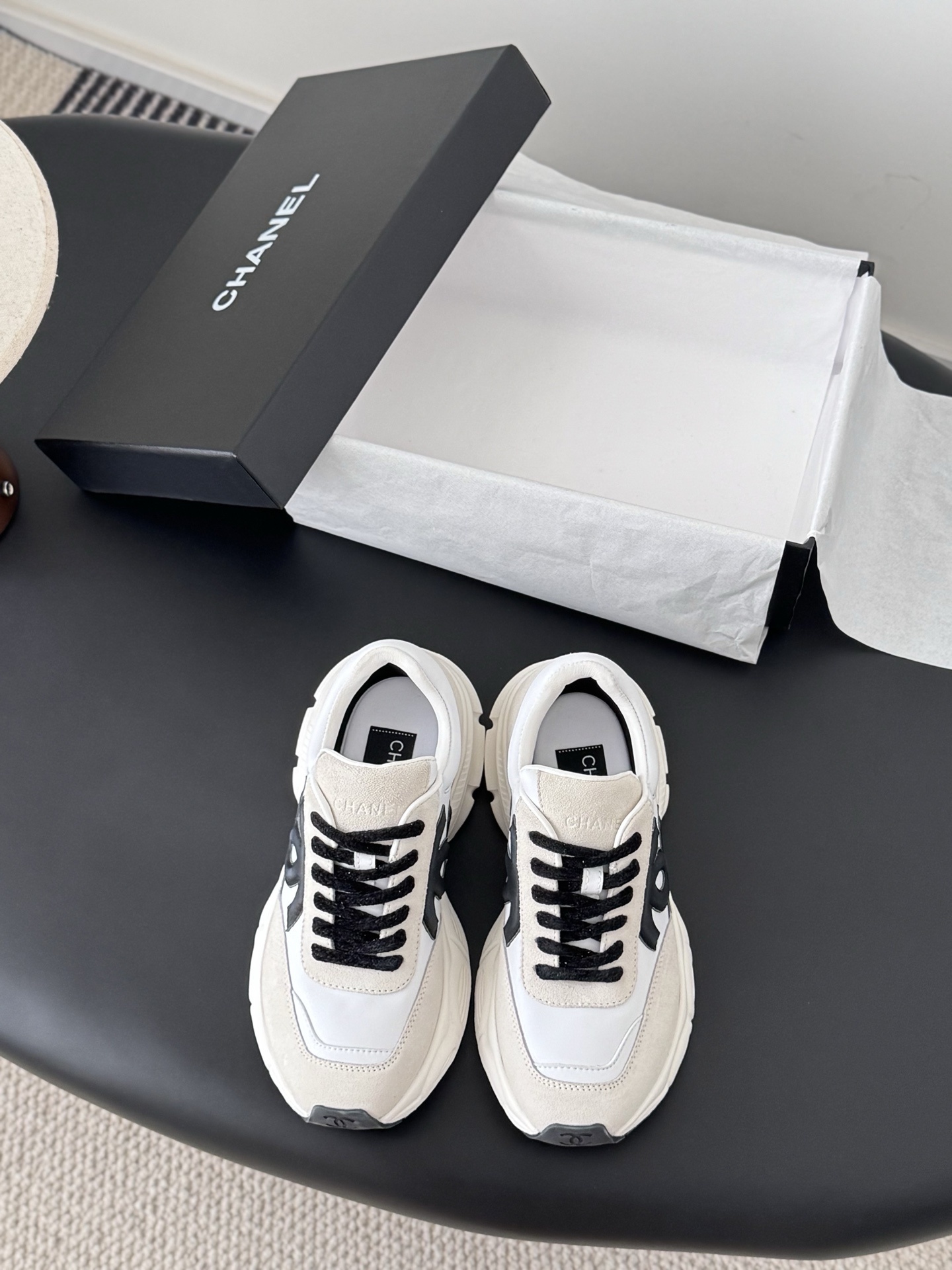 Chanel Women’s Ivory & Black Leather Sneakers – Iconic CC Logo