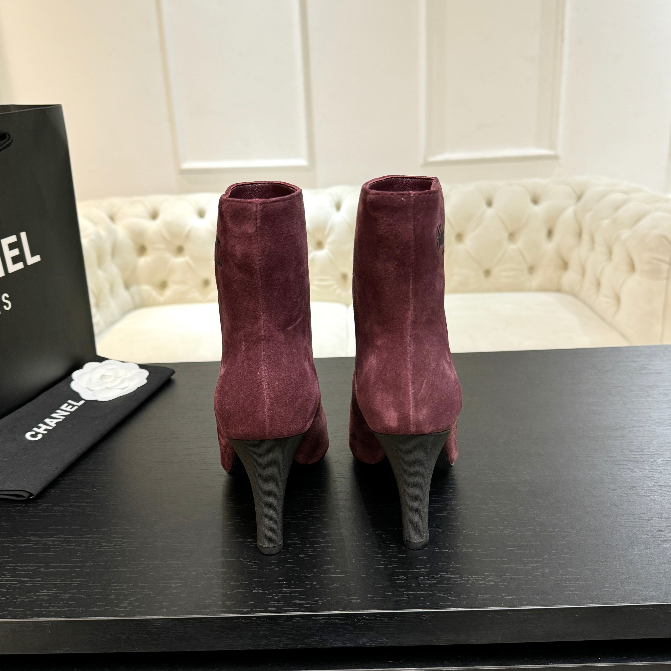 Burgundy Chanel suede ankle boots with black pointed cap toes and Gabrielle Chanel COCO embroidery on the side. - Hình 6