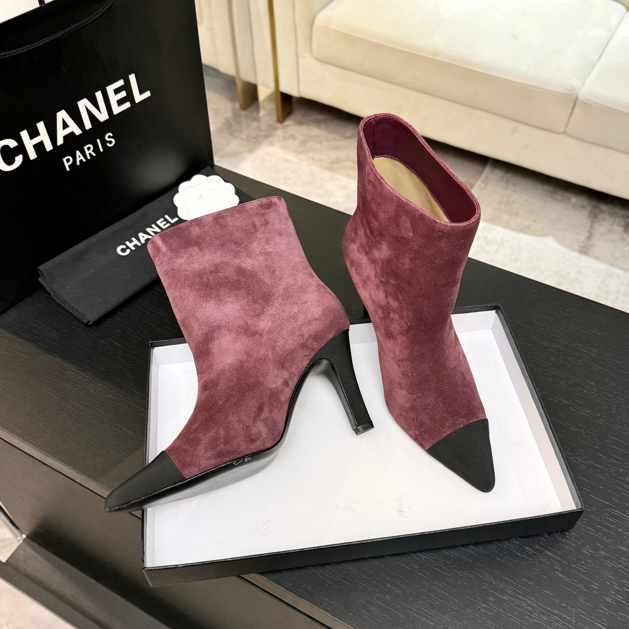 Burgundy Chanel suede ankle boots with black pointed cap toes and Gabrielle Chanel COCO embroidery on the side. - Hình 4