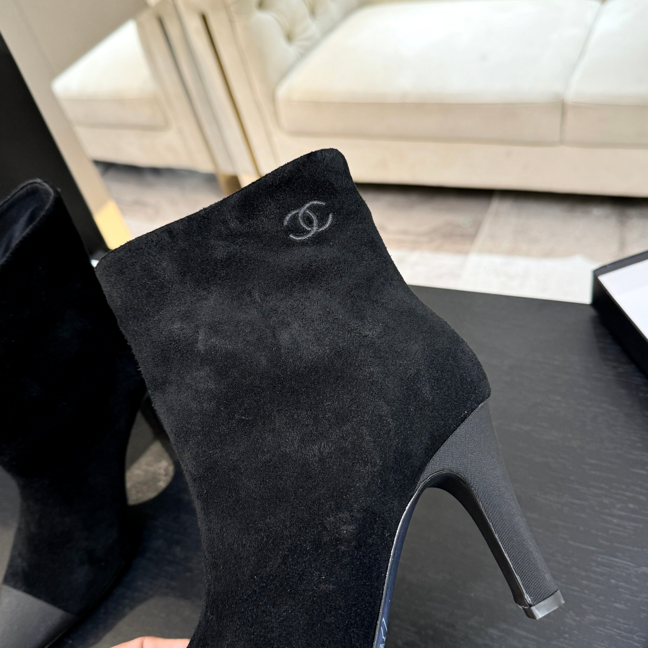 Pair of luxury Chanel Gabrielle black suede ankle boots with pointed grey cap-toe and COCO embroidery detail. - Hình 6