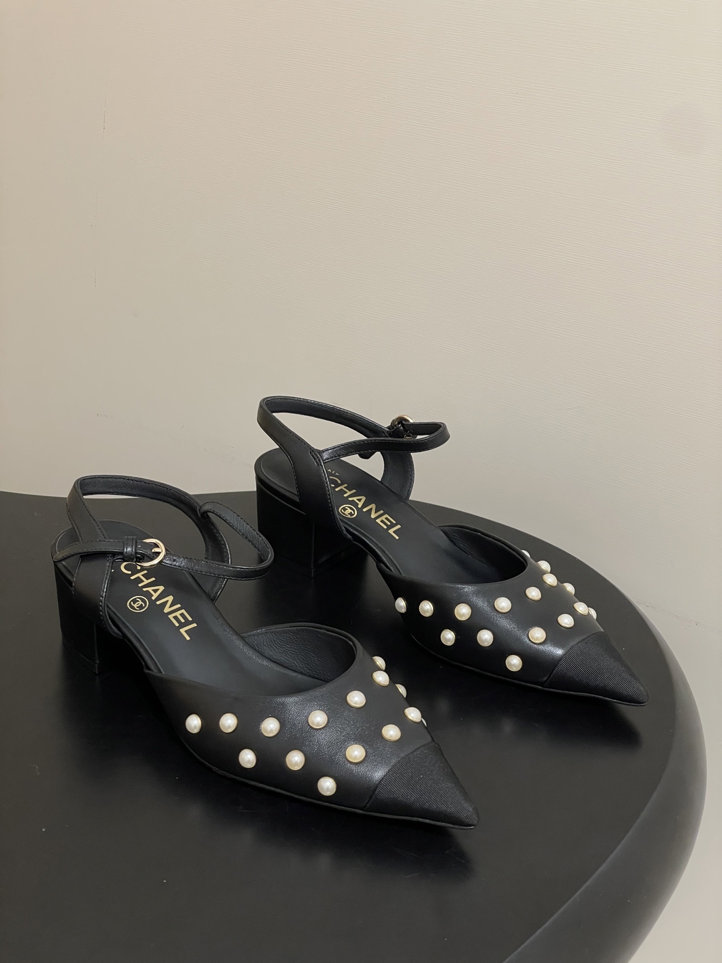 Chanel Black Leather Pearl Slingback Heels – Elegant Pointed Toe