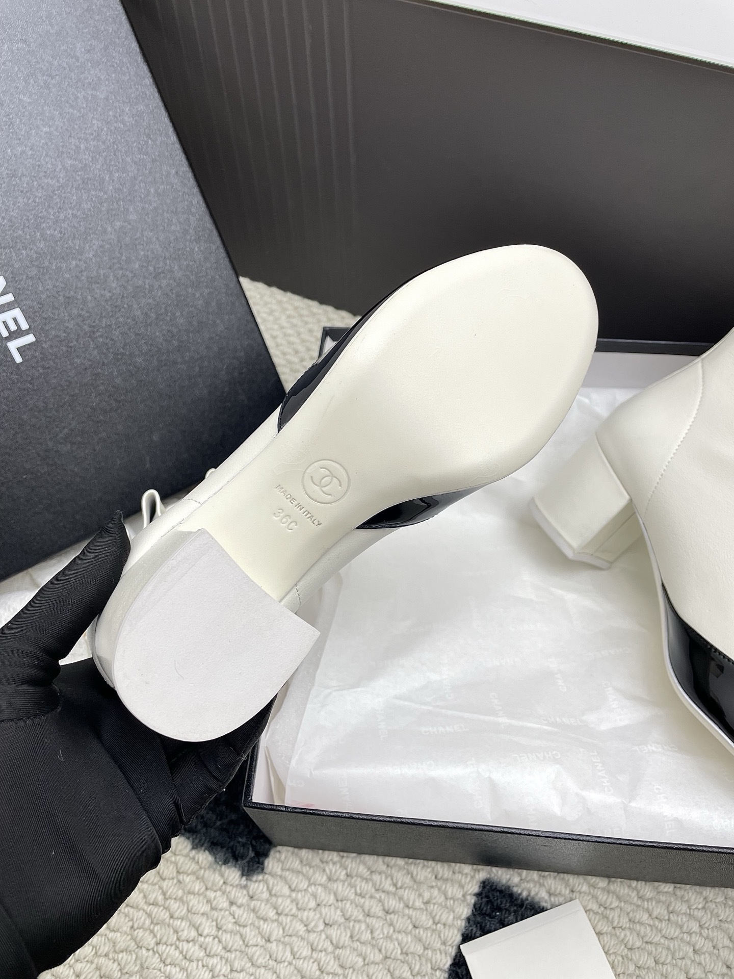 Chanel two-tone ankle boots in cream leather with black patent toe and ruffle collar detail - Hình 10